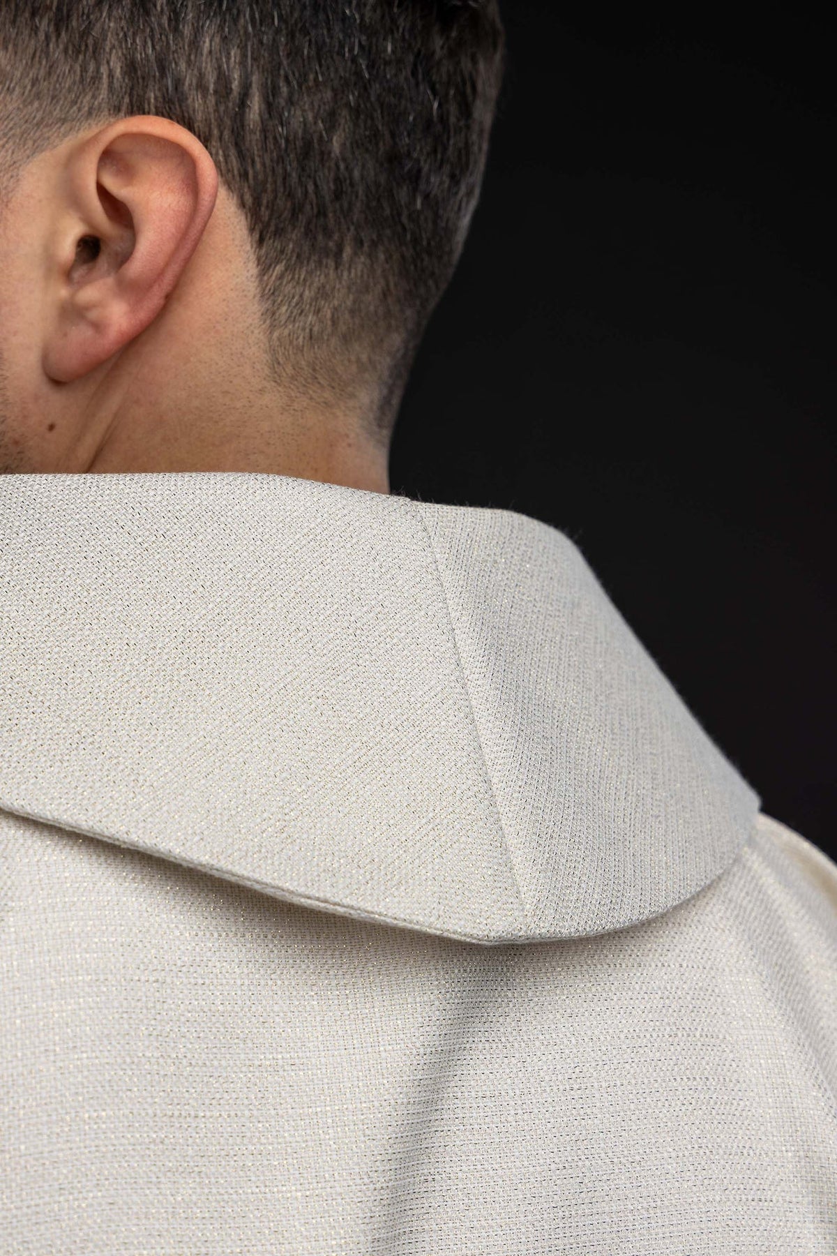 Close-up of the ecru chasuble collar and plain back fabric