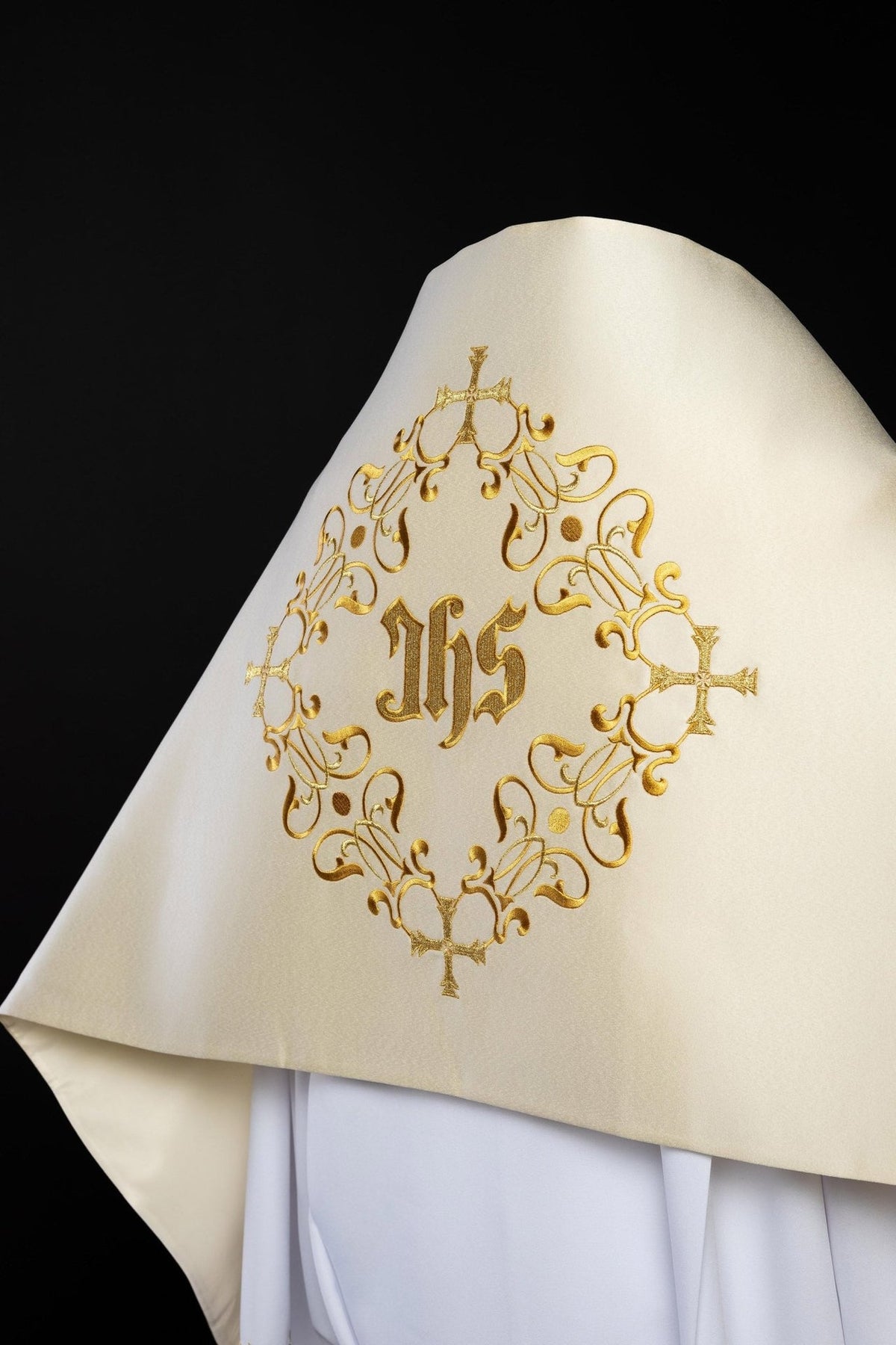 Front view of Ecru Humeral Veil Embroidered with an IHS Floral Motif in gold embroidery