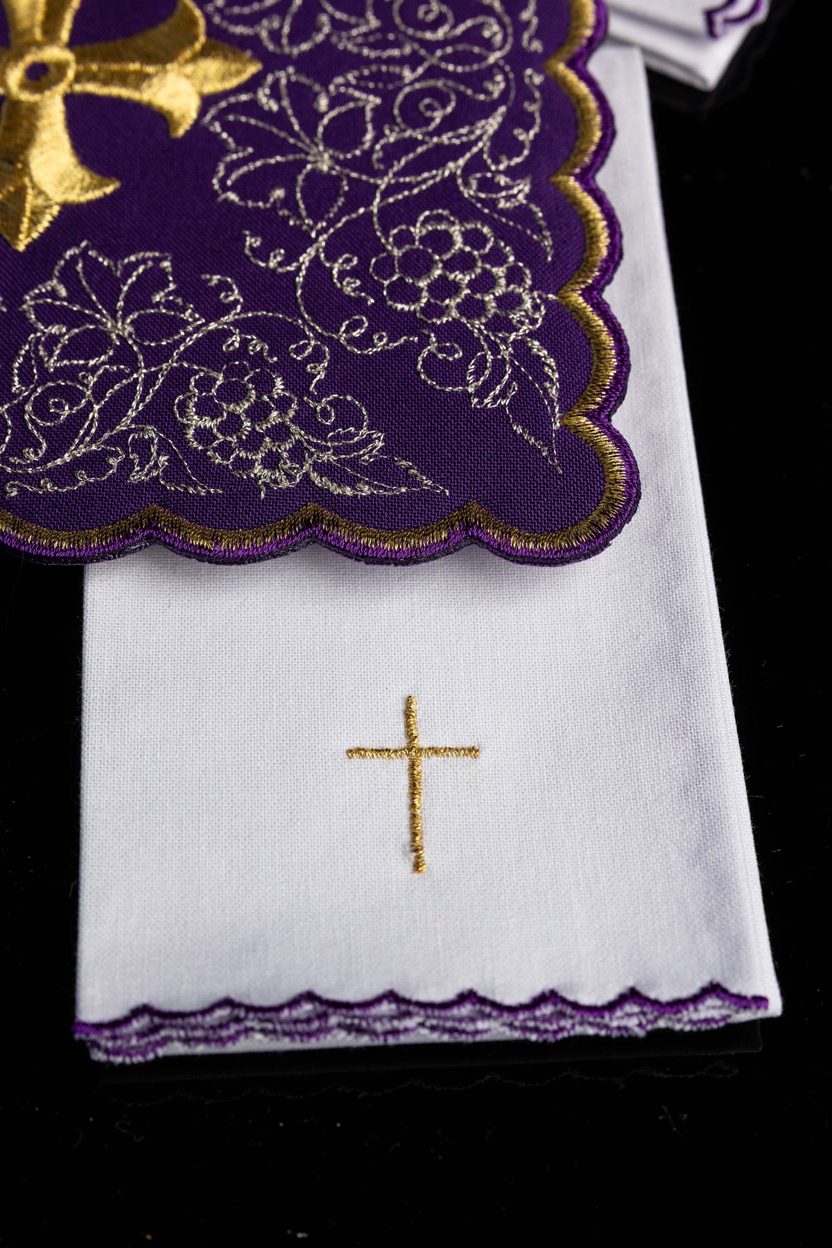 Embroidered chalice linens set with a purple cross motif