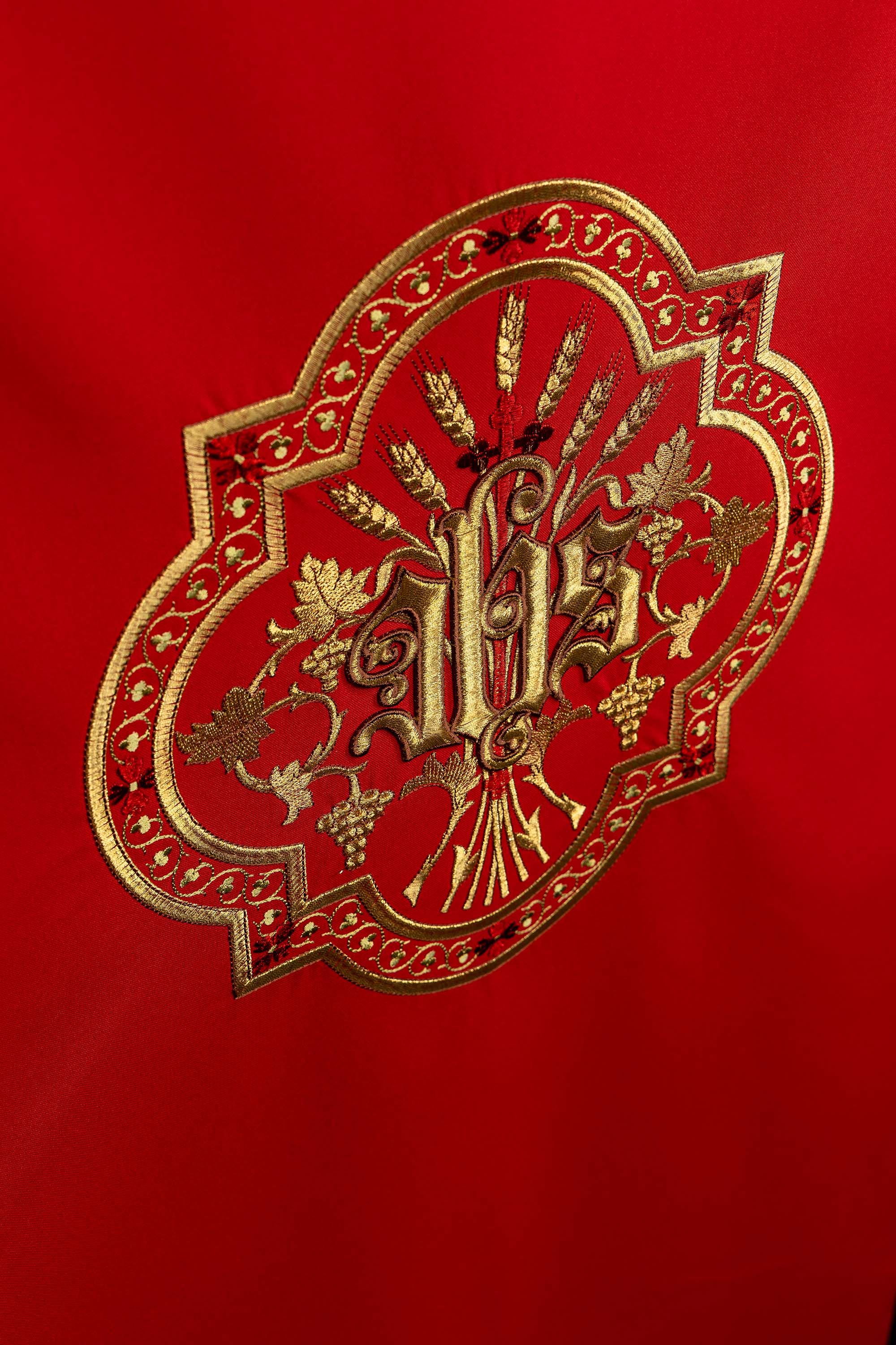 Red lectern cover with golden embroidery IHS