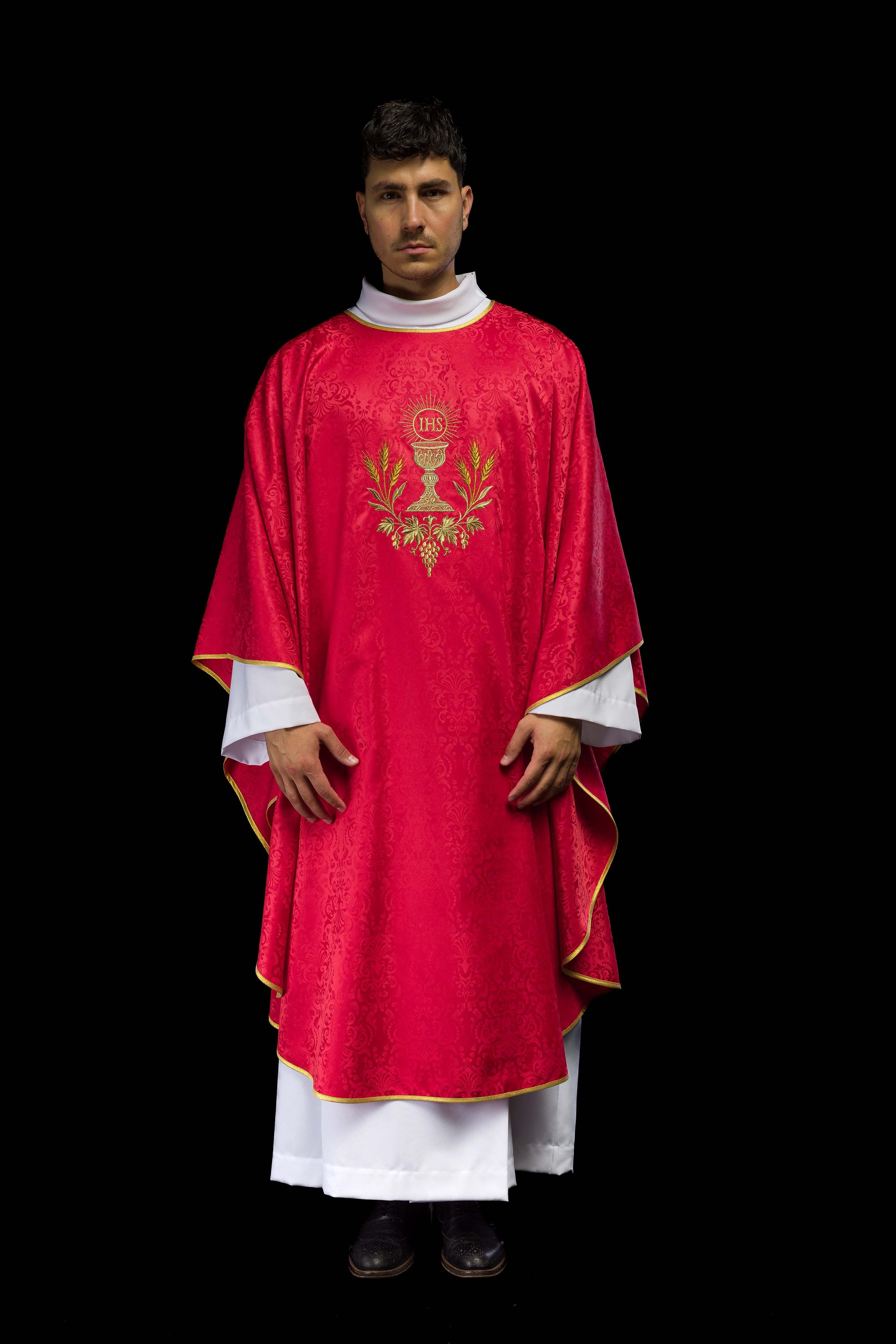 Red liturgical chasuble with embroidered chalice and host on jacquard fabric