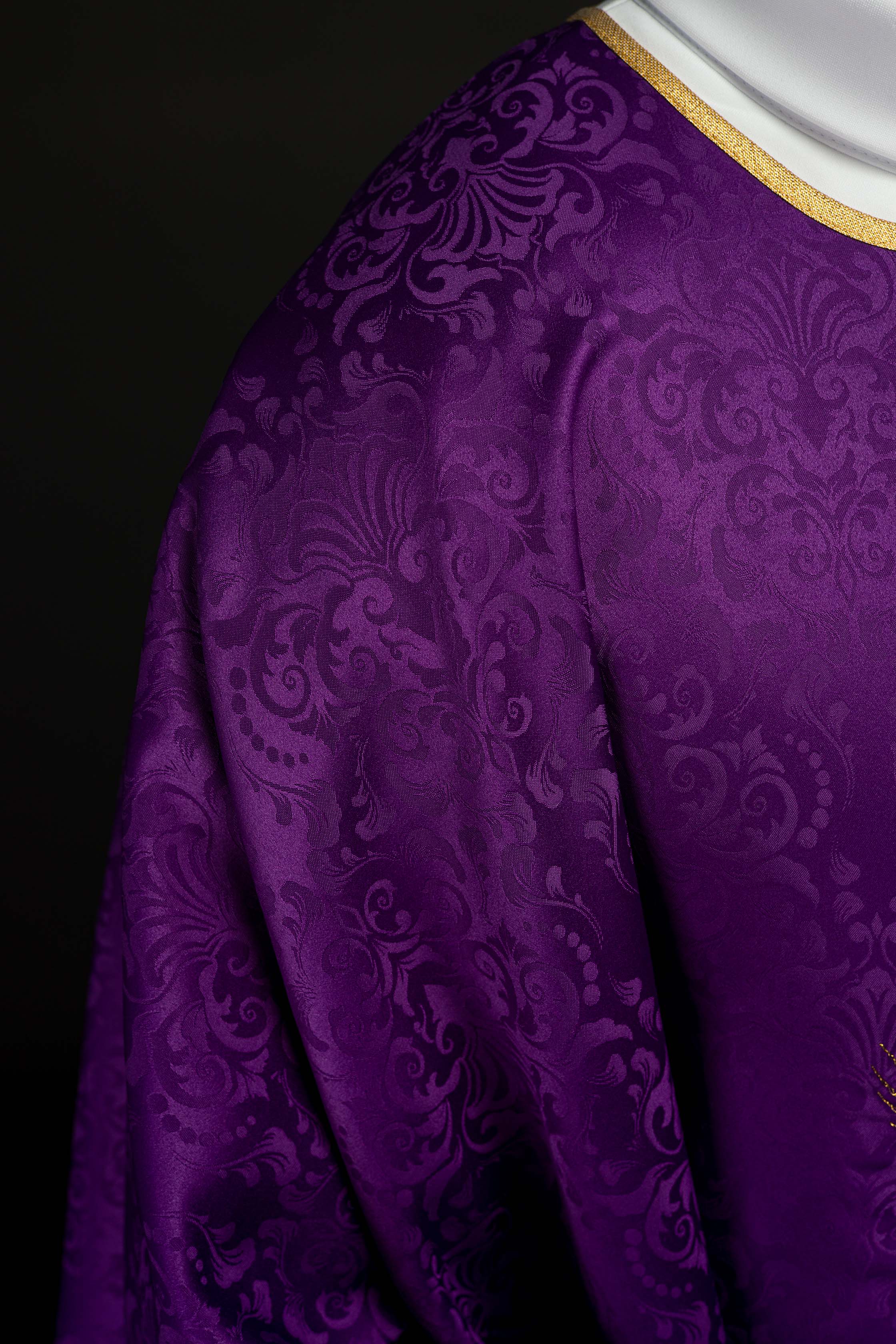 Purple liturgical chasuble with embroidered chalice and host on jacquard fabric