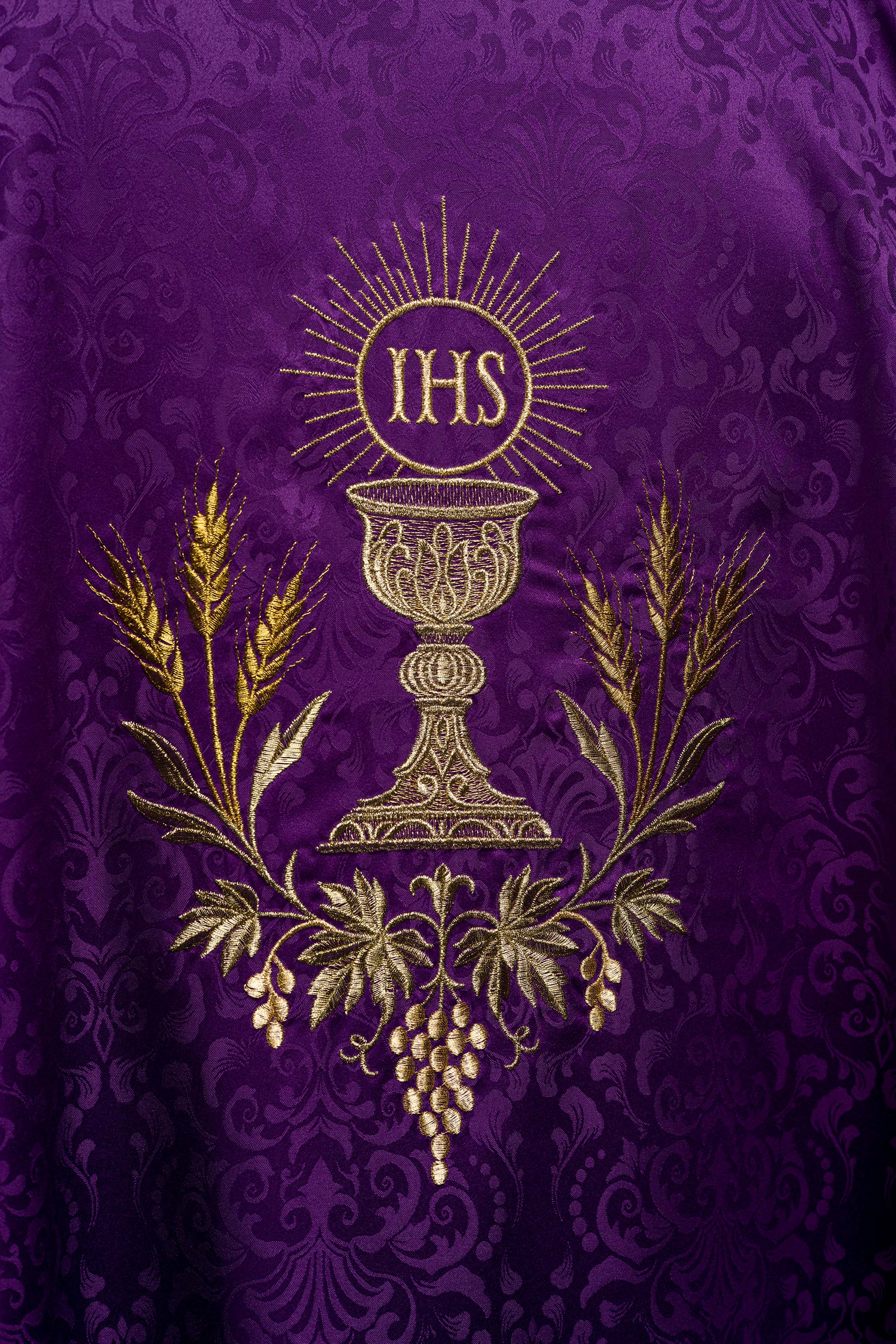 Purple liturgical chasuble with embroidered chalice and host on jacquard fabric