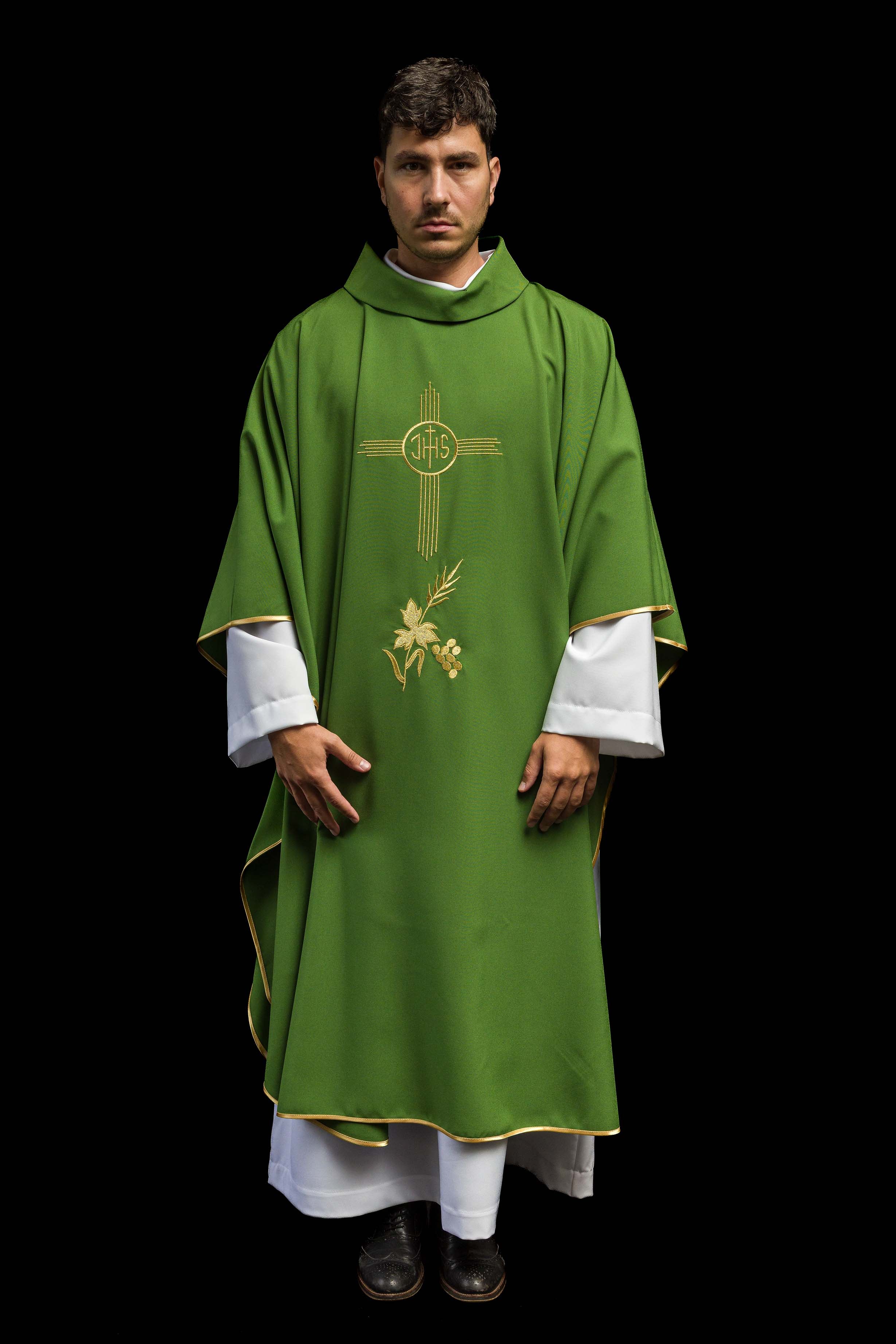 Green chasuble embroidered with IHS motif