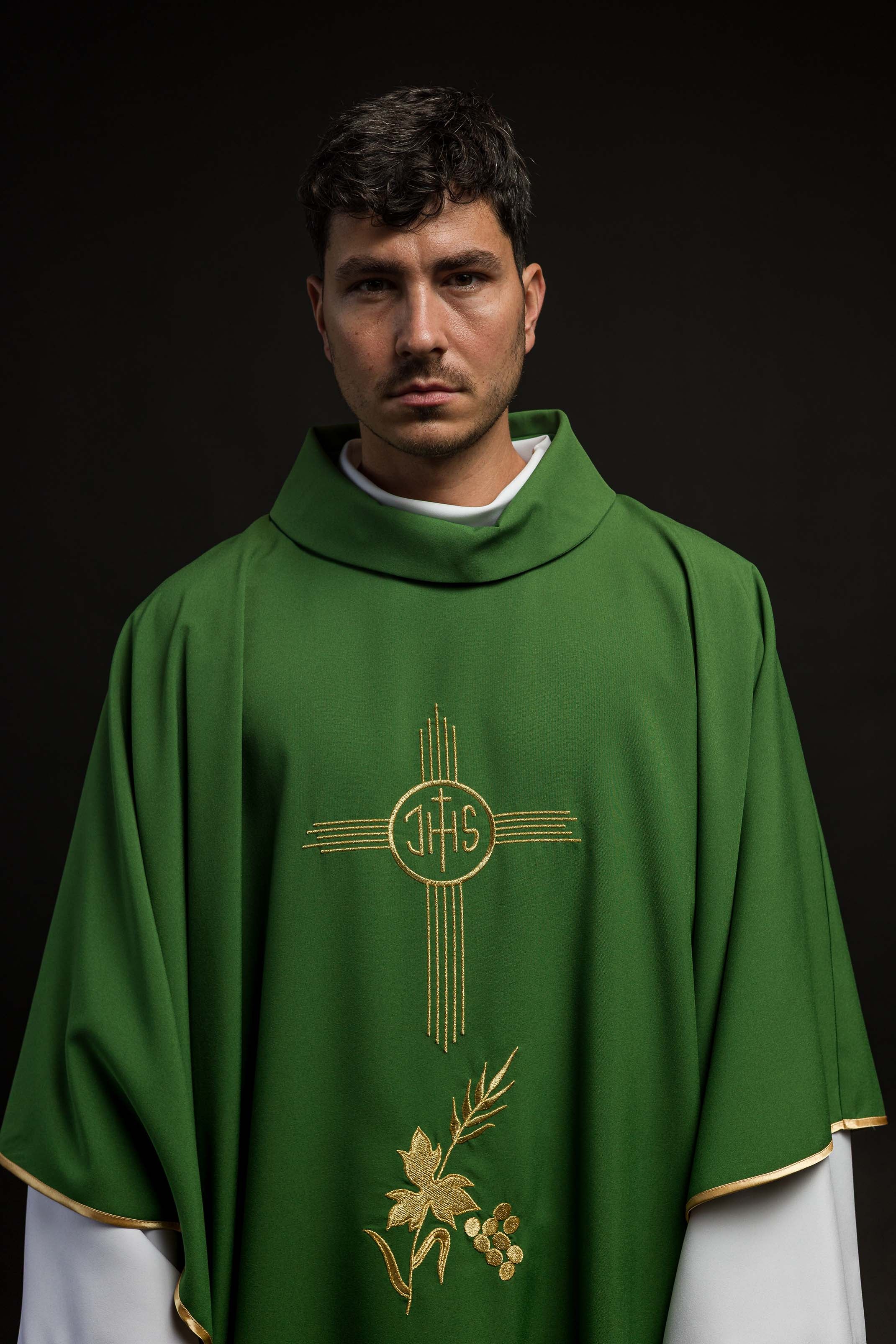 Green chasuble embroidered with IHS motif