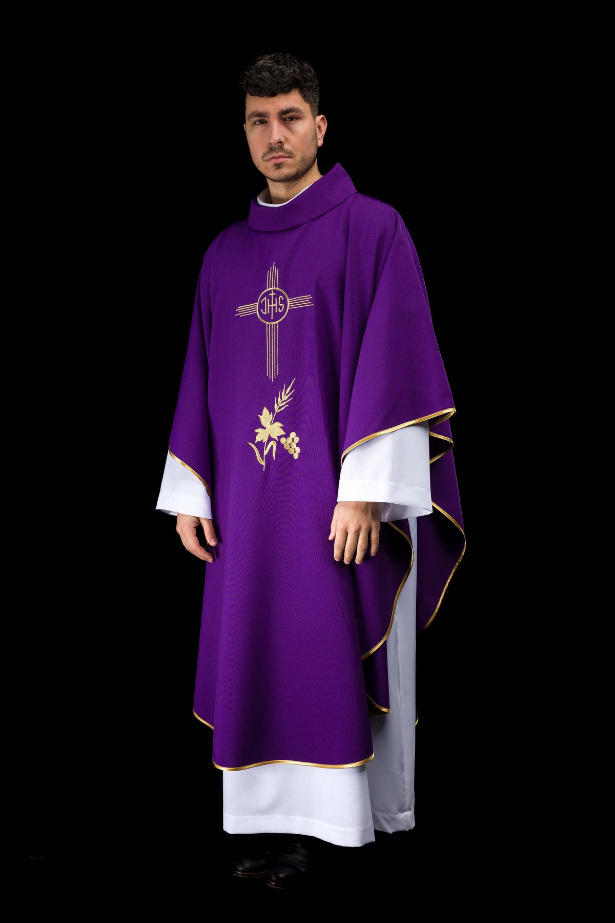 Purple chasuble embroidered with IHS motif
