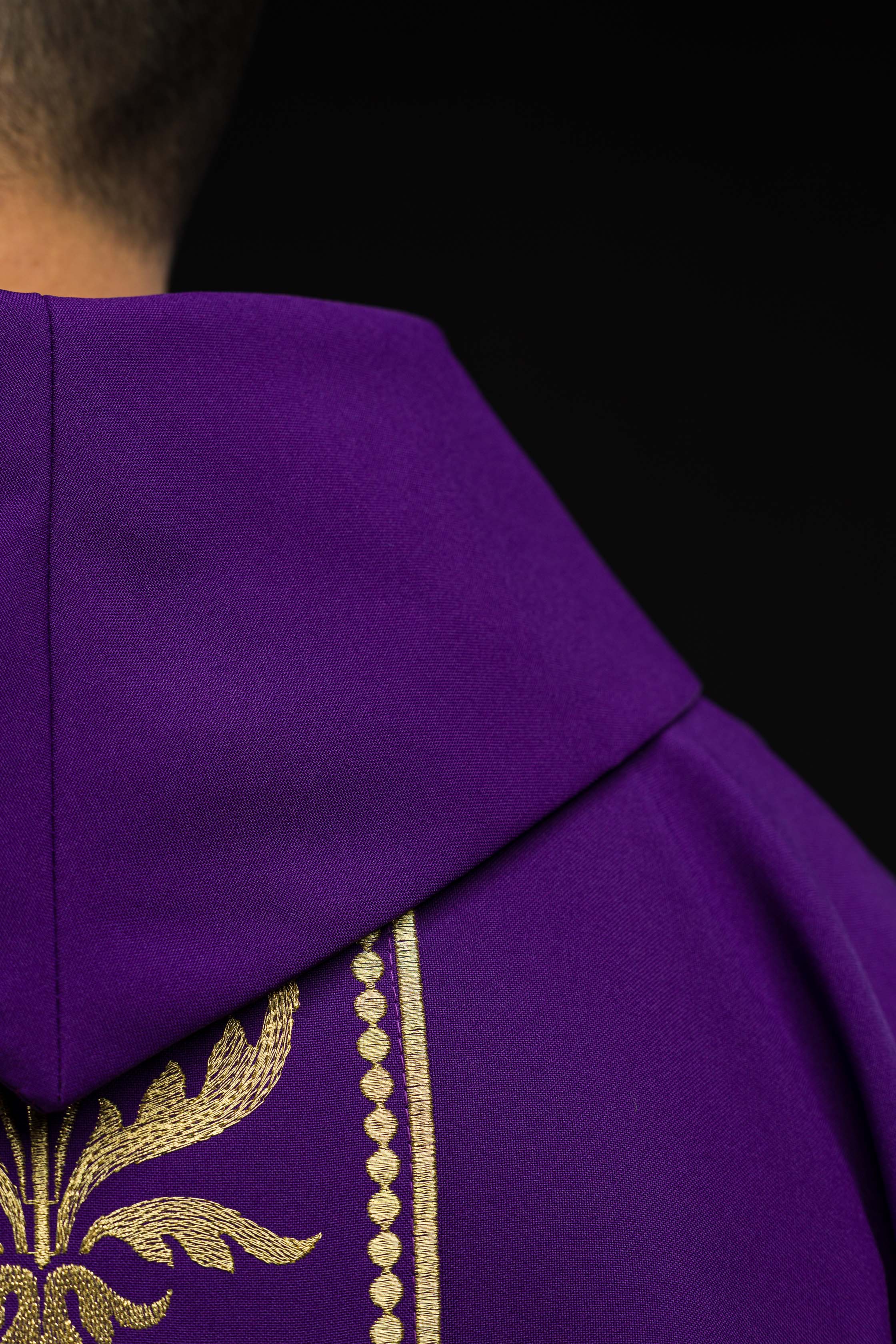 Purple liturgical chasuble decorated with a gold embroidered belt