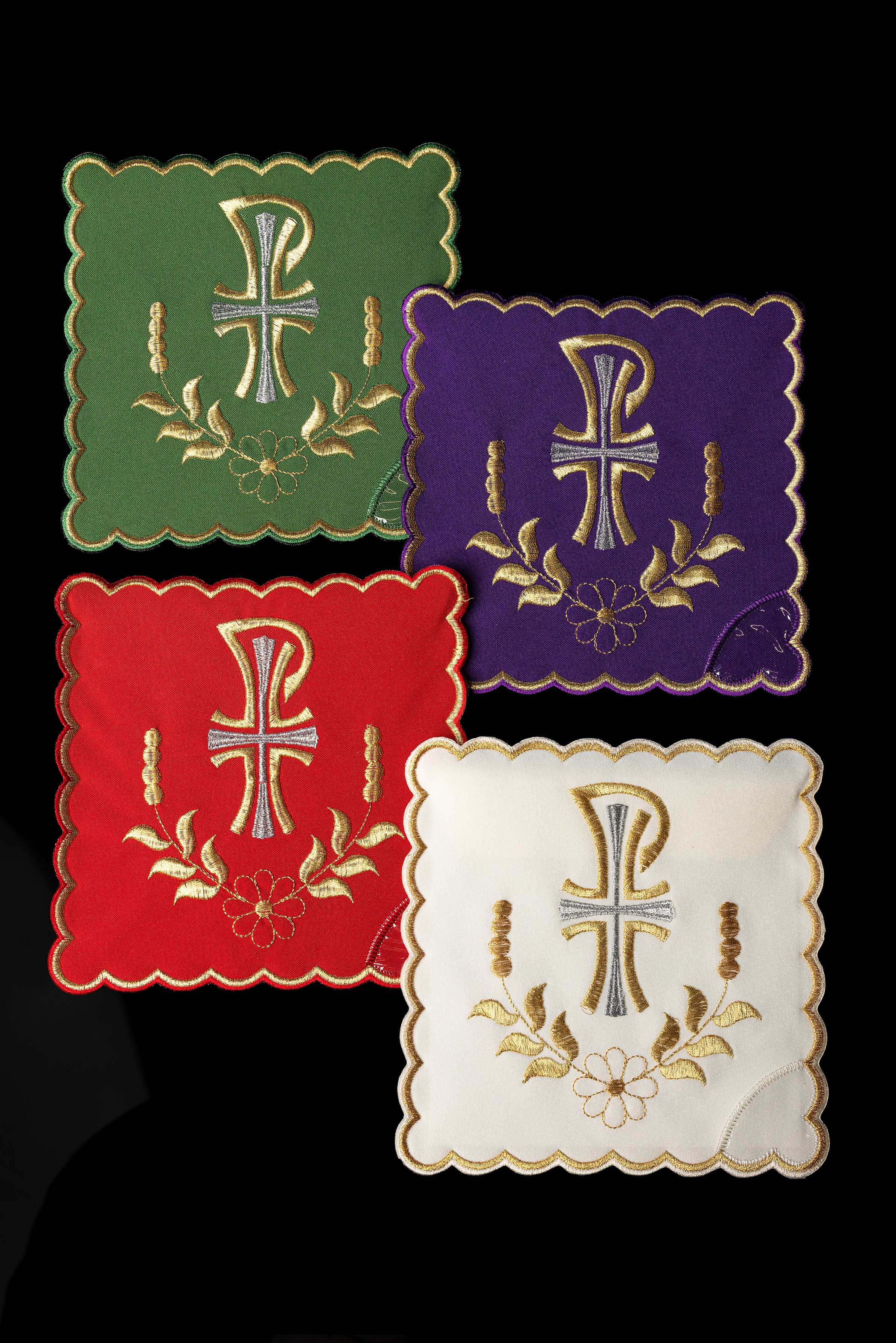Set of chalice palls with the PAX symbol in four liturgical colors