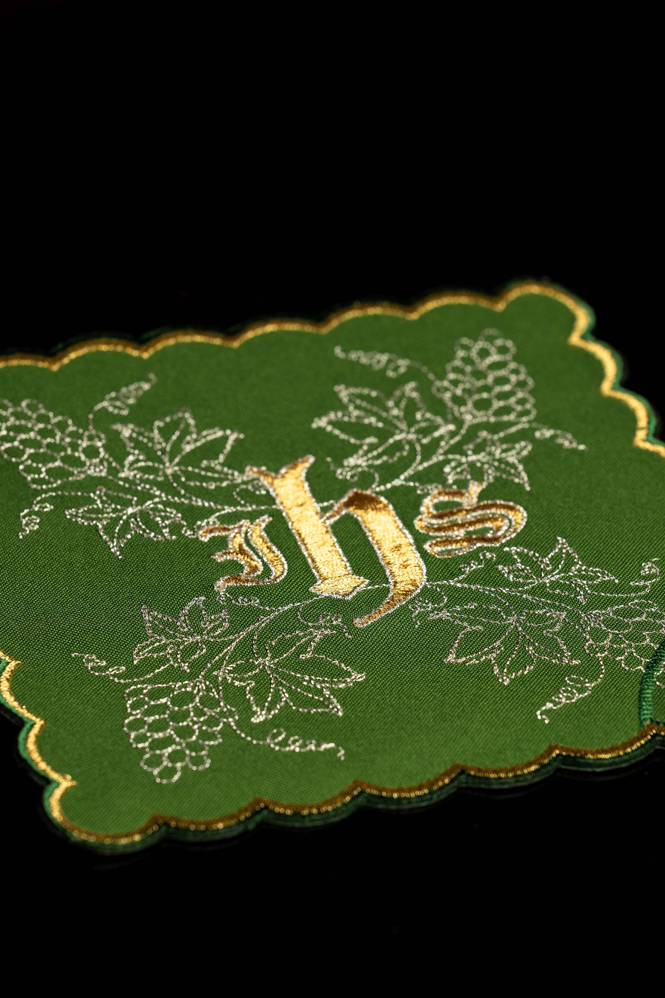Set of chalice palls with the IHS symbol in four liturgical colors