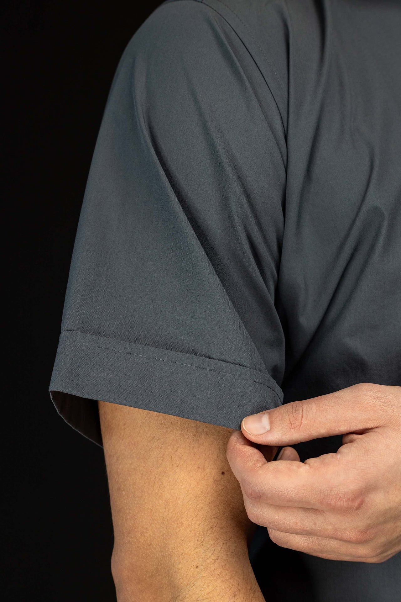 Dark grey short-sleeved clerical shirt with clerical collar