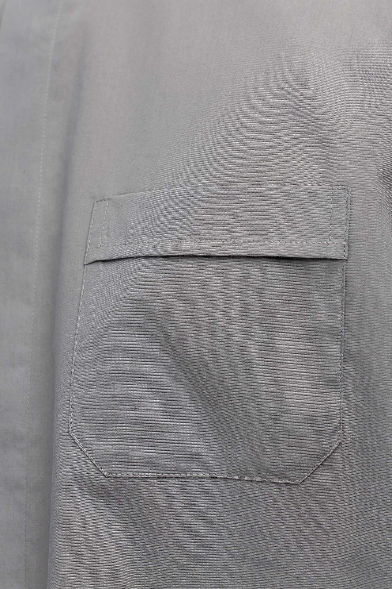 Light grey short-sleeved clerical shirt with clerical collar