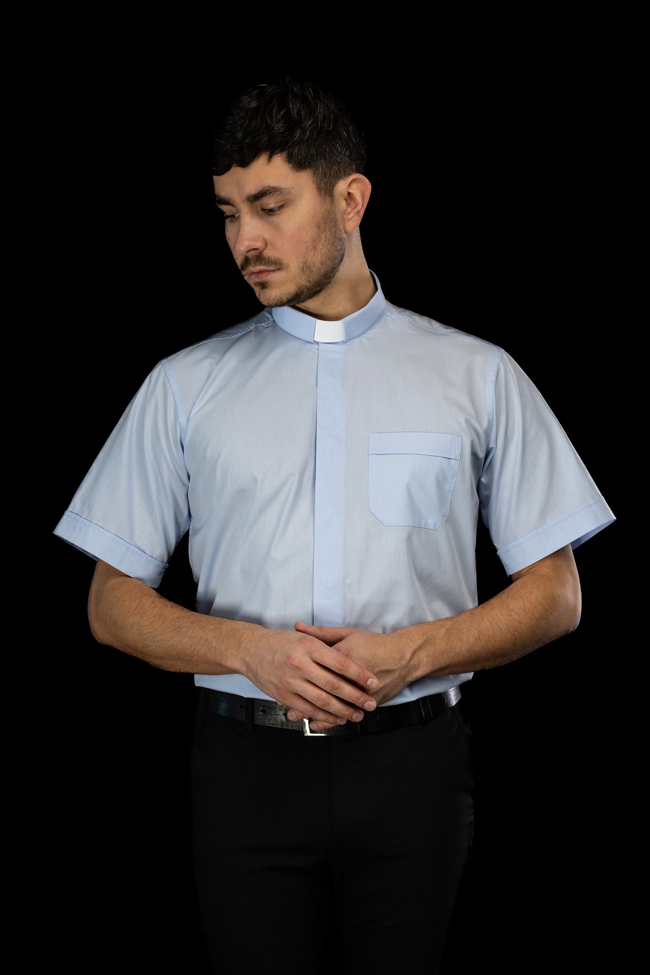 Blue short-sleeved clerical shirt with clerical collar