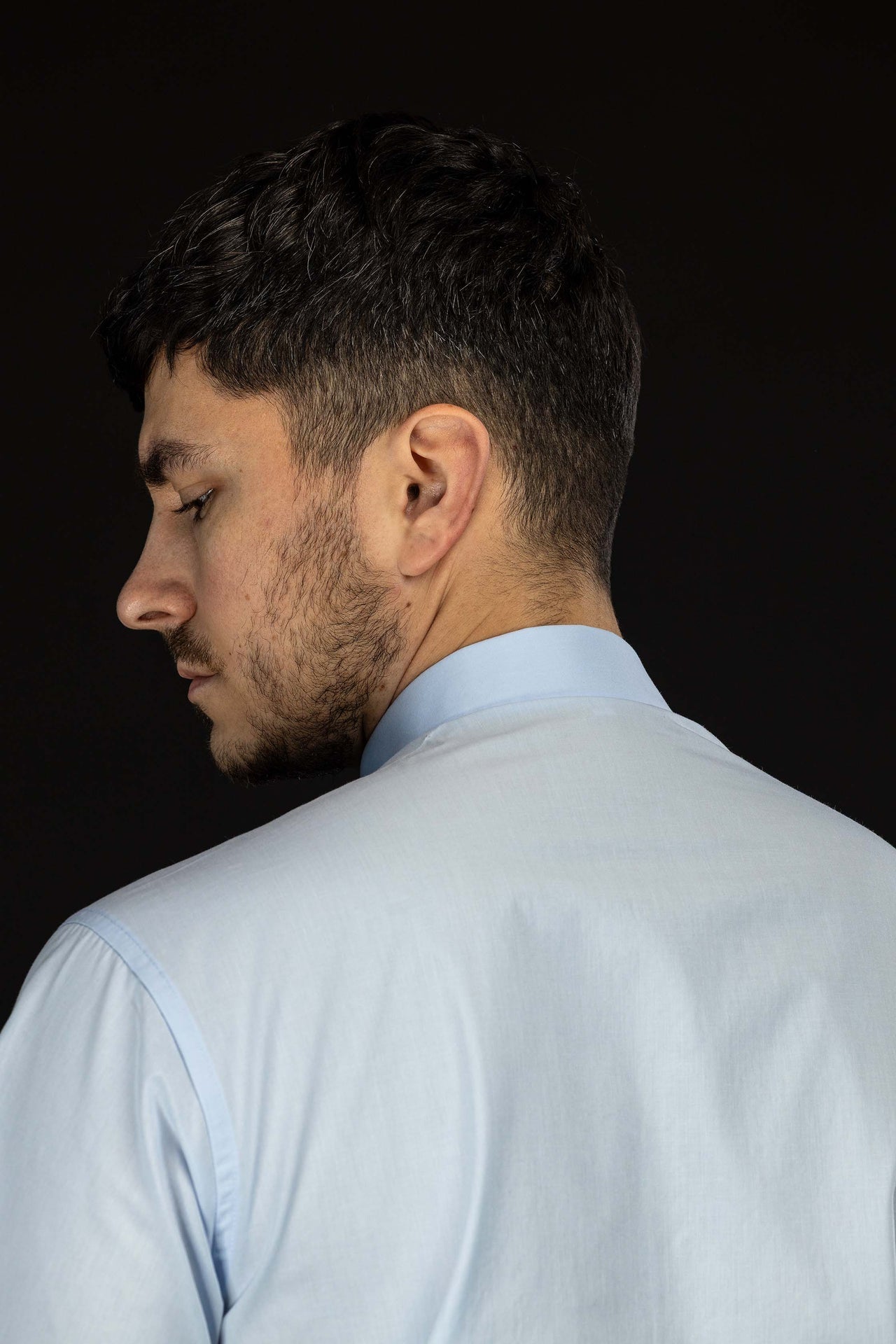 Blue short-sleeved clerical shirt with clerical collar