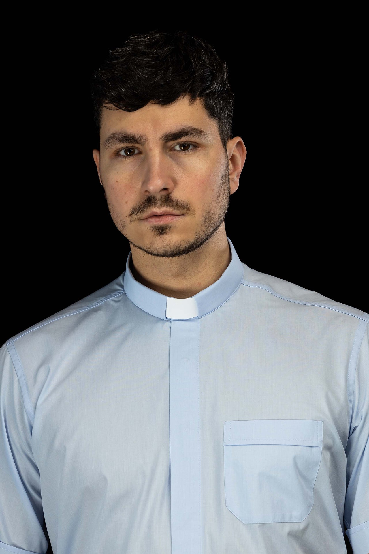 Blue short-sleeved clerical shirt with clerical collar