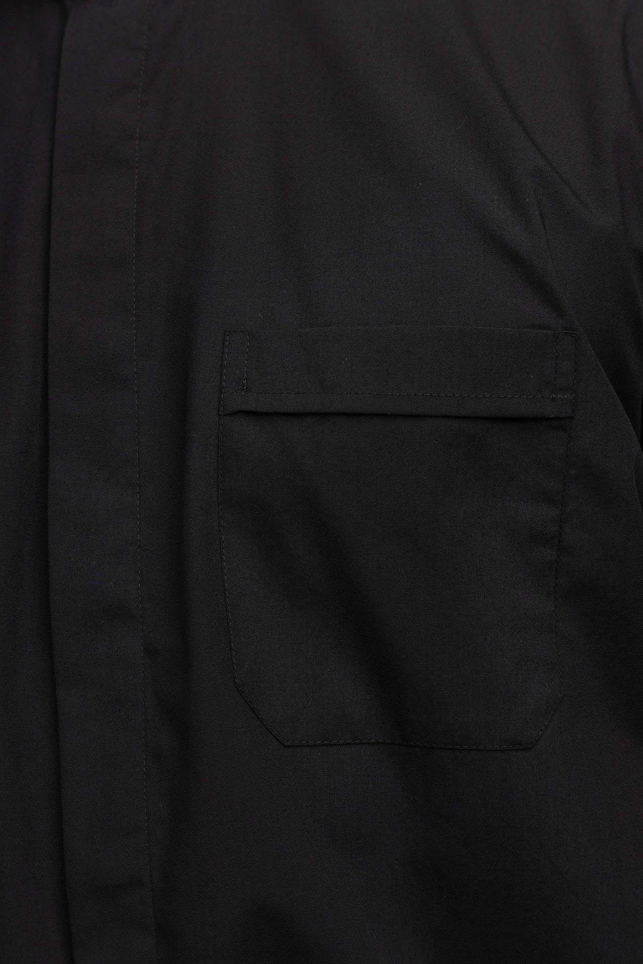 Black short-sleeved Roman clerical shirt with clerical collar