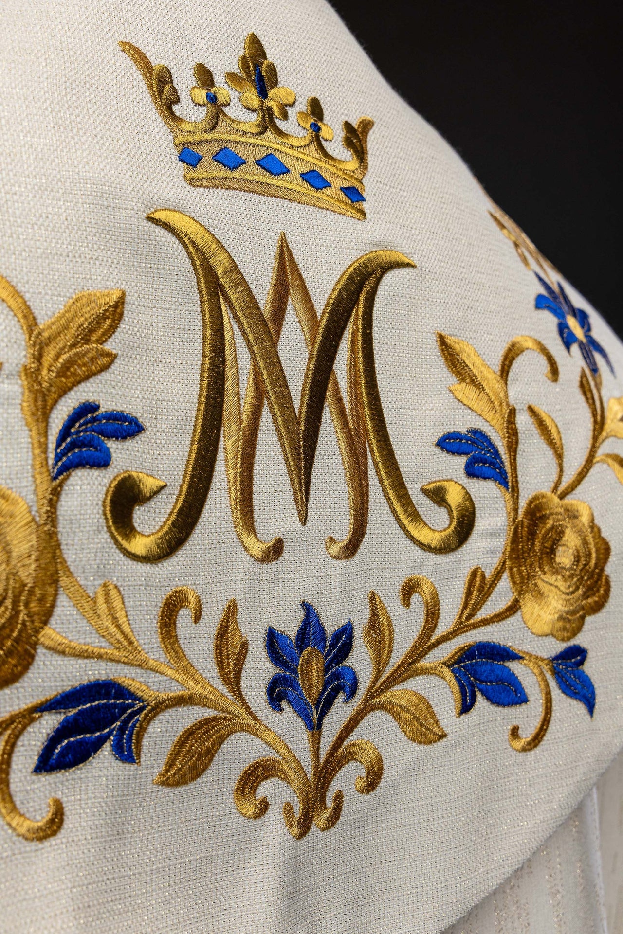 Ecru embroidered cope with a Marian symbol