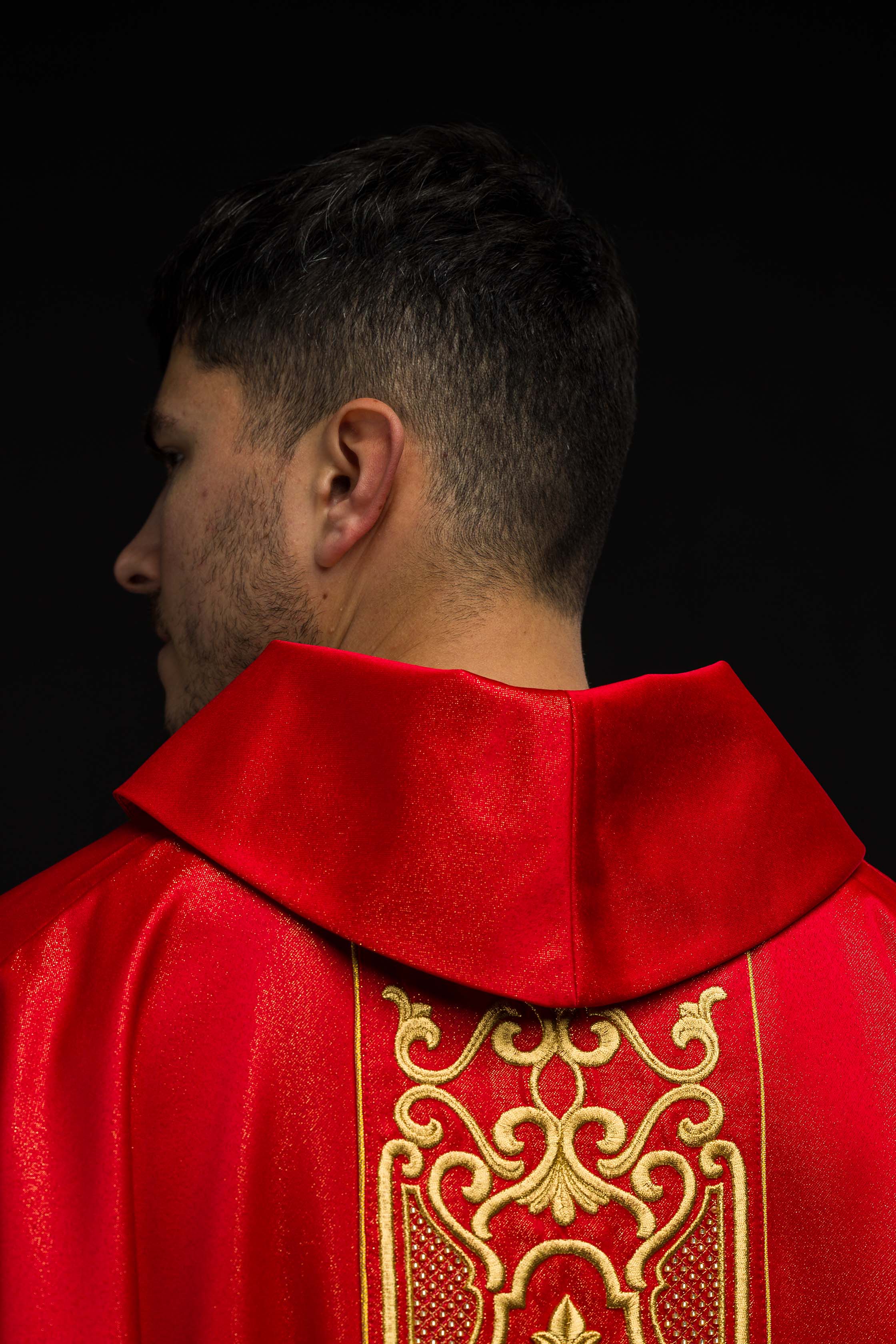 Red chasuble on shiny fabric