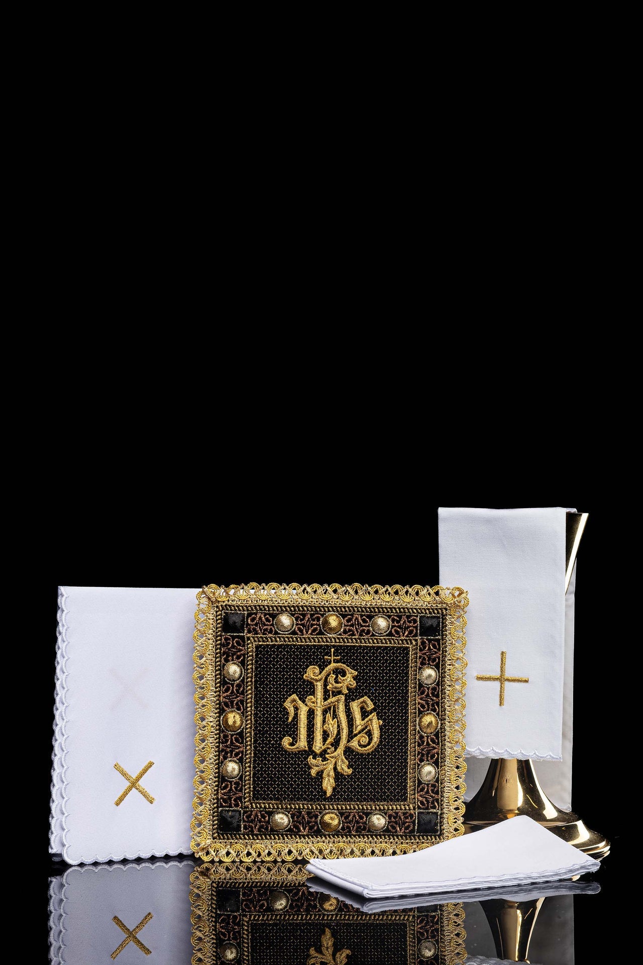 Black velvet chalice linens set with an embroidered IHS symbol