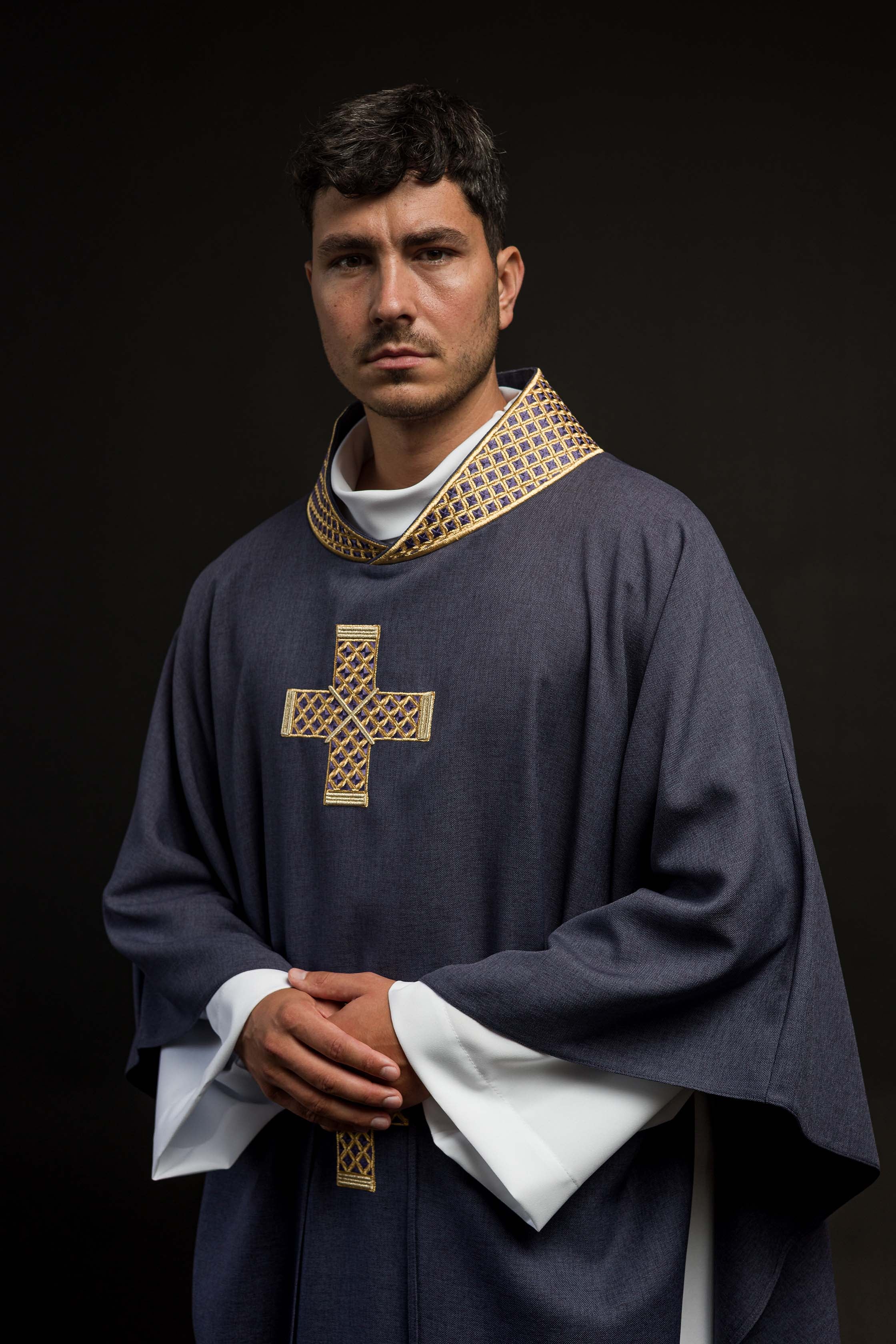 Dark purple chasuble with embroidered crosses