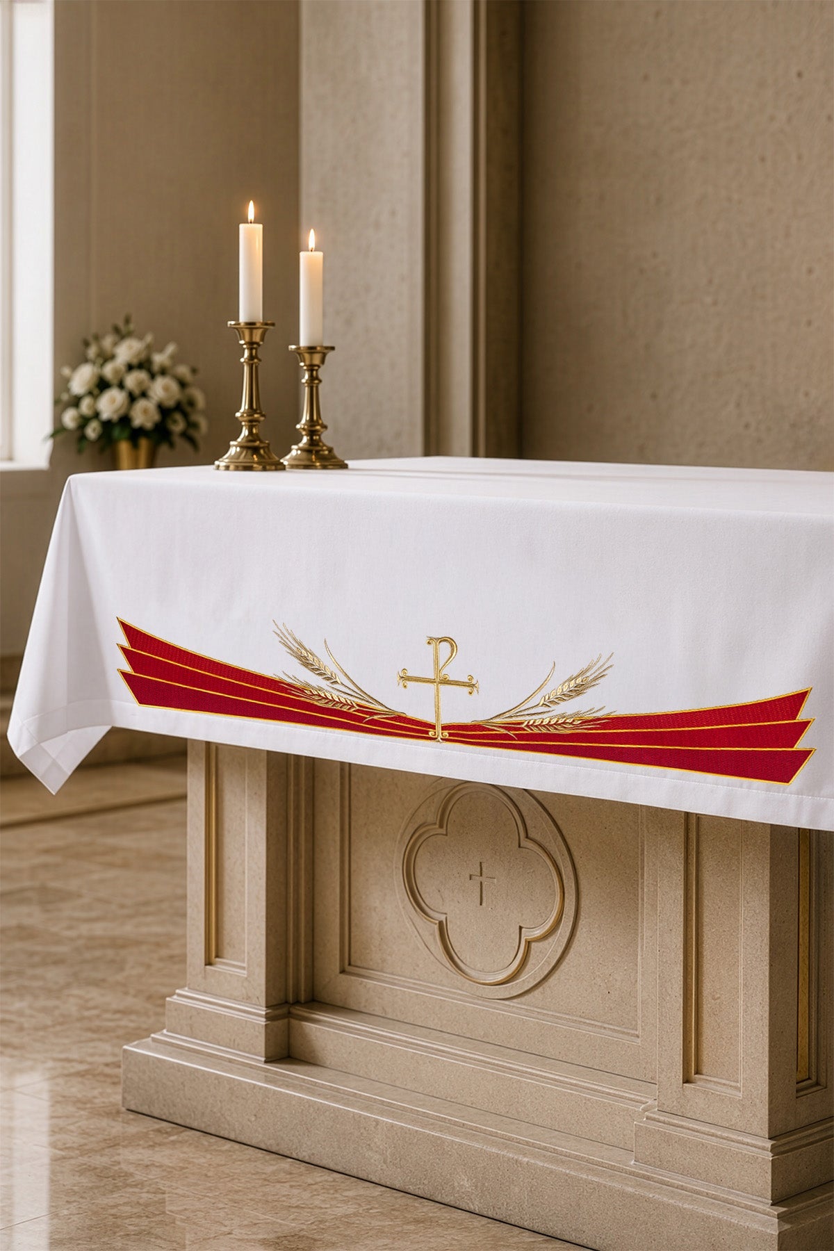 Front view of an Altar cloth with an embroidered Pax symbol, white with red and gold embroidery