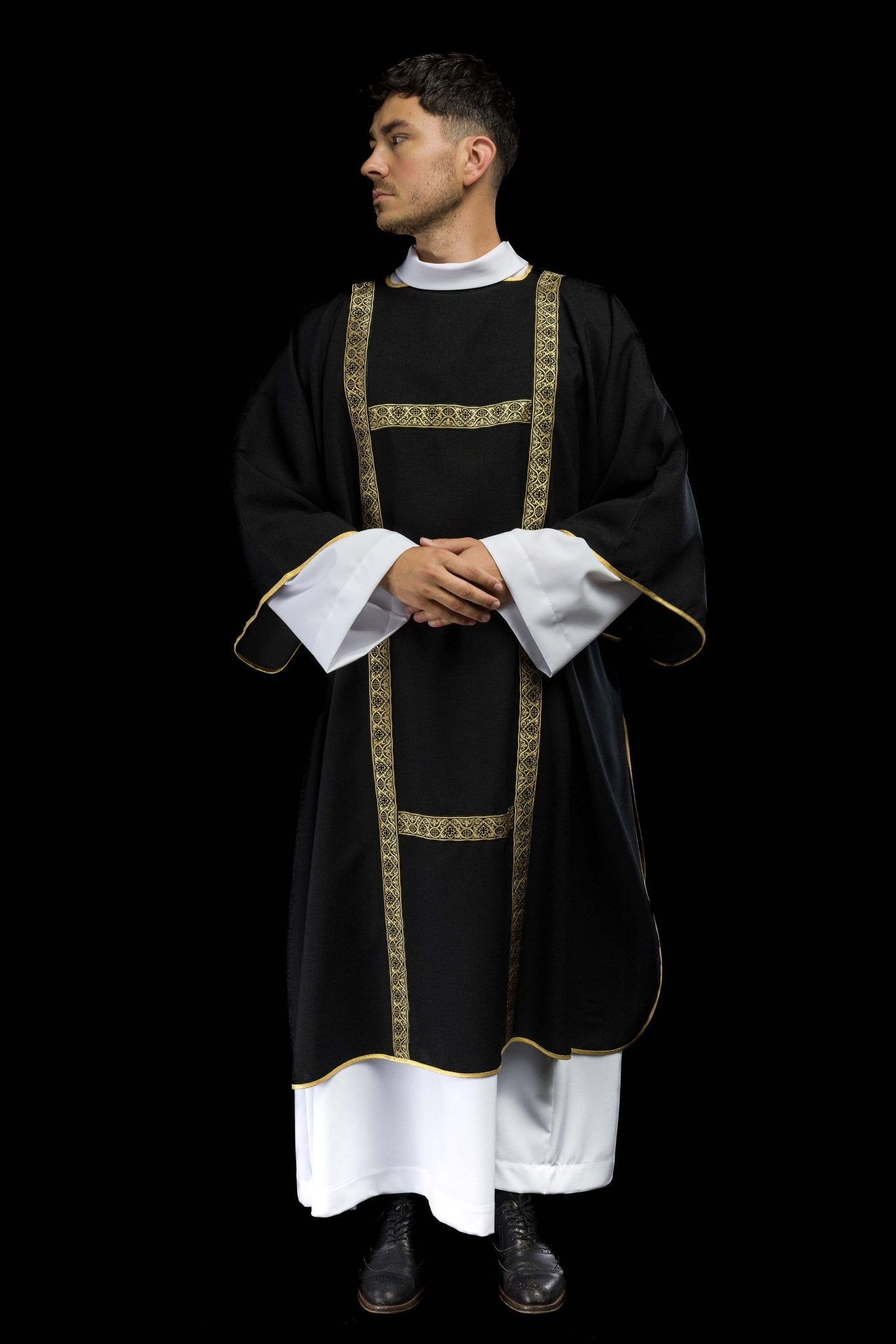 Black dalmatic decorated with gold jacquard ribbons KDL/395/07/70/B - CHASUBLES.COM