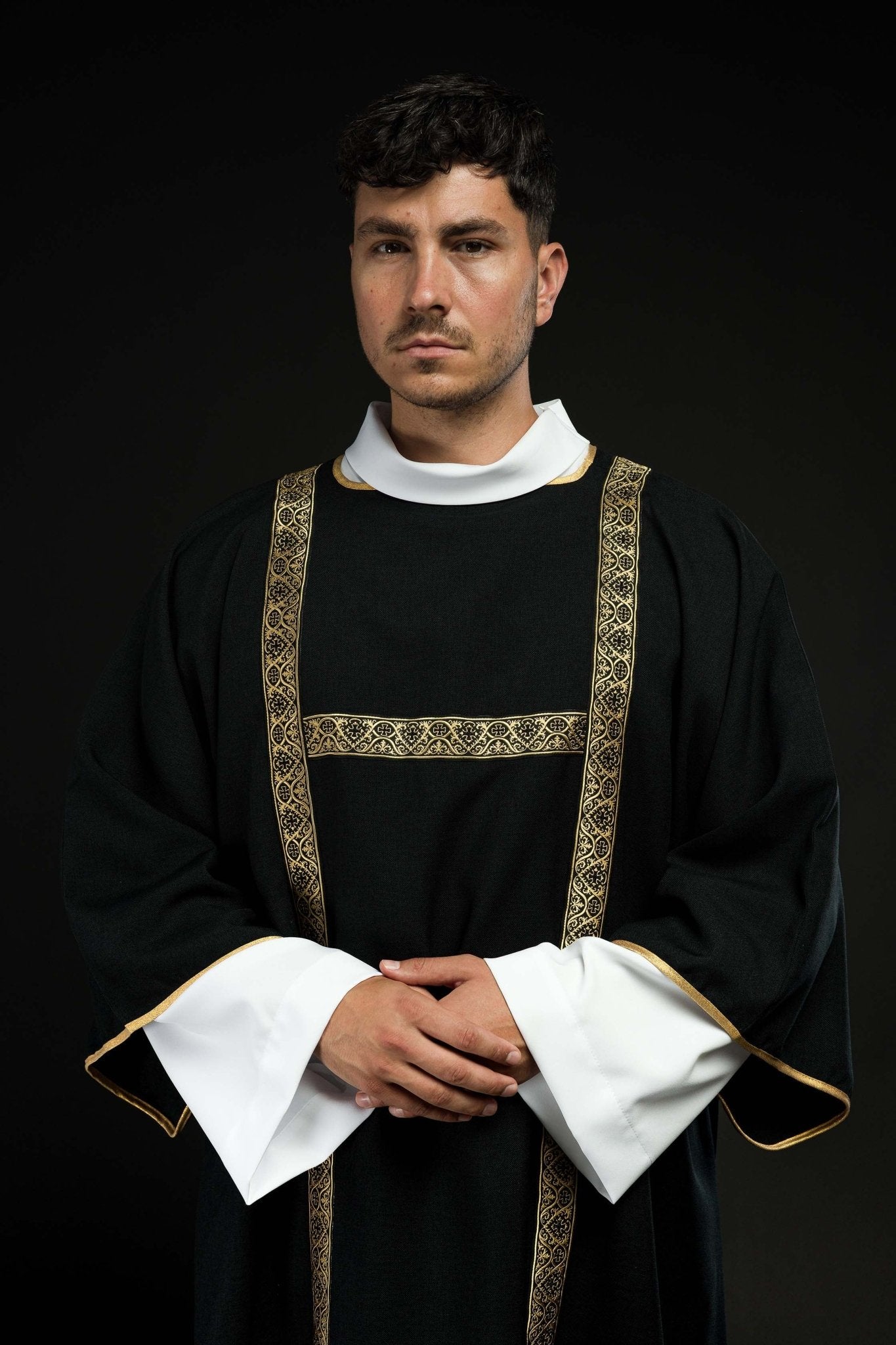 Black dalmatic decorated with gold jacquard ribbons KDL/395/07/70/B - CHASUBLES.COM