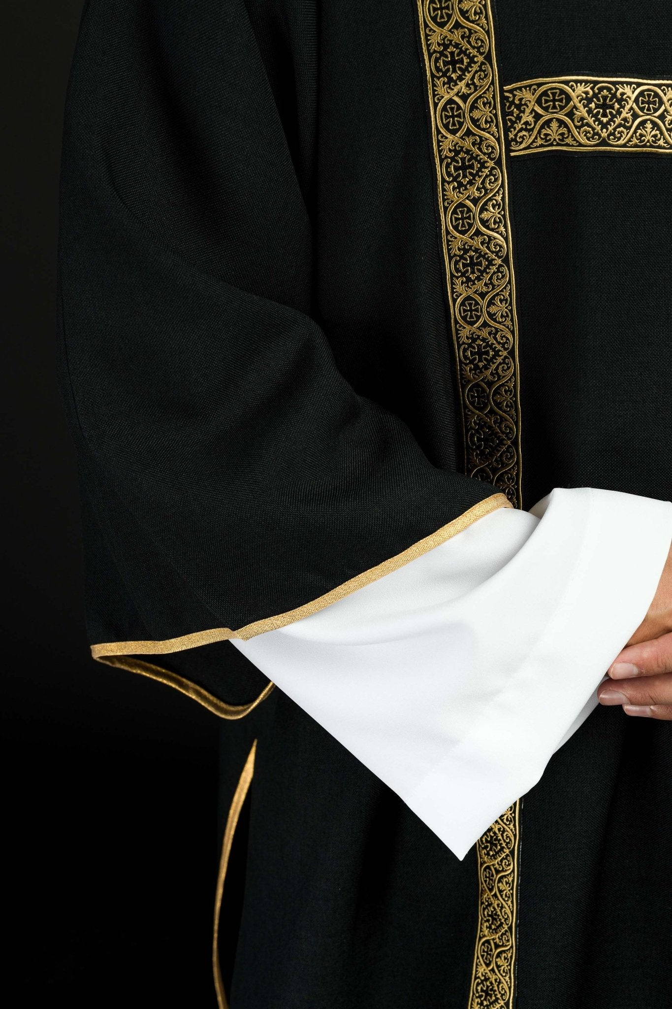 Black dalmatic decorated with gold jacquard ribbons KDL/395/07/70/B - CHASUBLES.COM