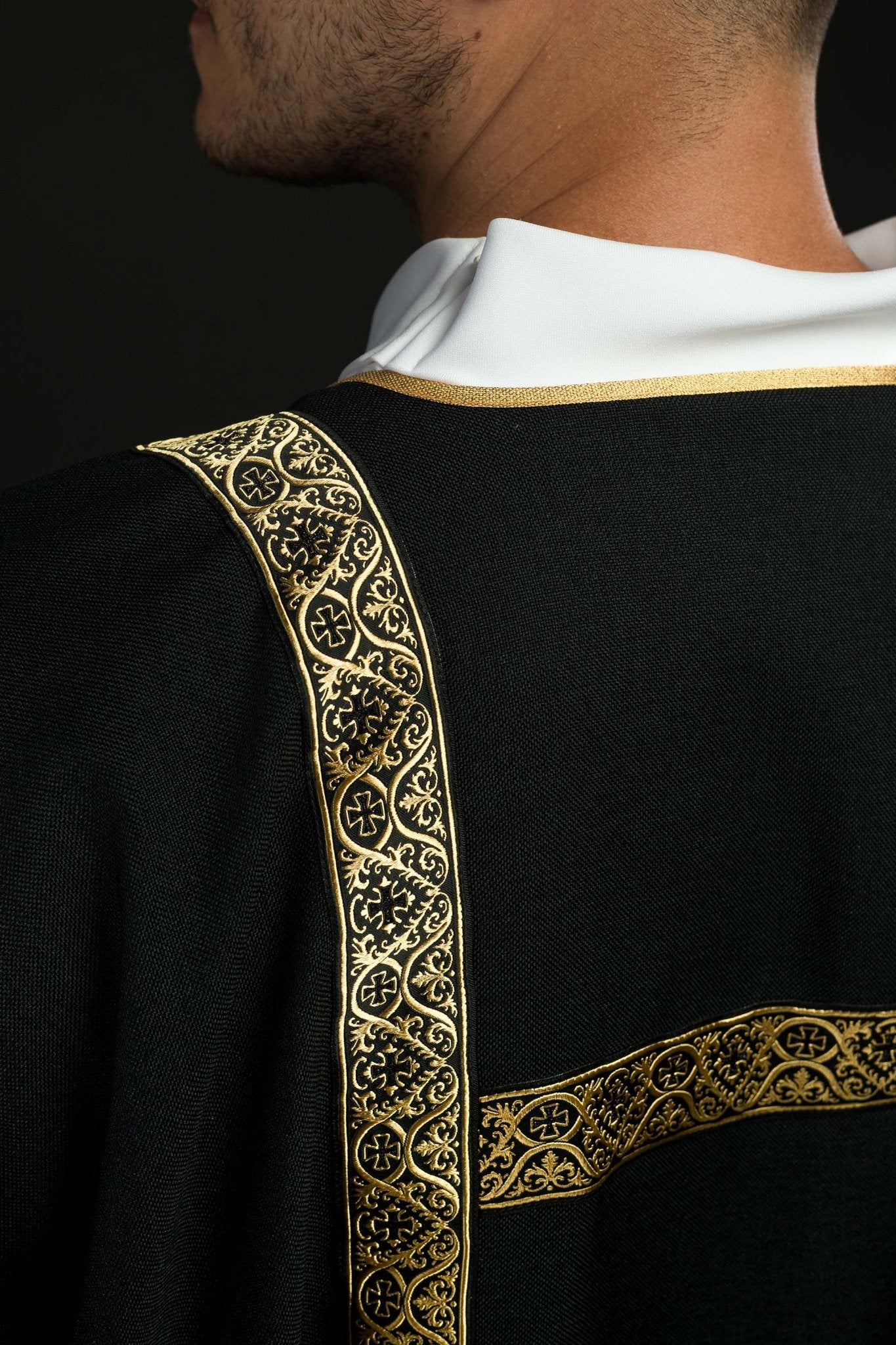 Black dalmatic decorated with gold jacquard ribbons KDL/395/07/70/B - CHASUBLES.COM