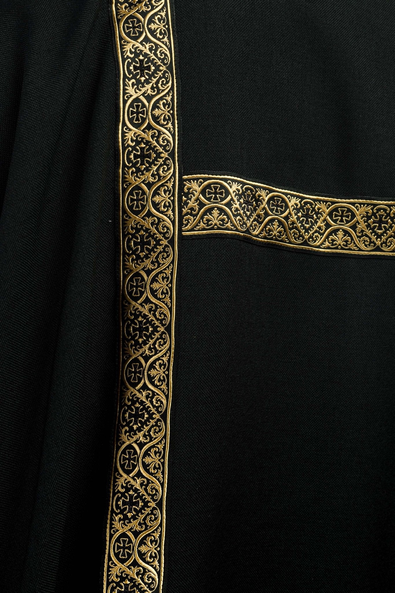 Black dalmatic decorated with gold jacquard ribbons KDL/395/07/70/B - CHASUBLES.COM