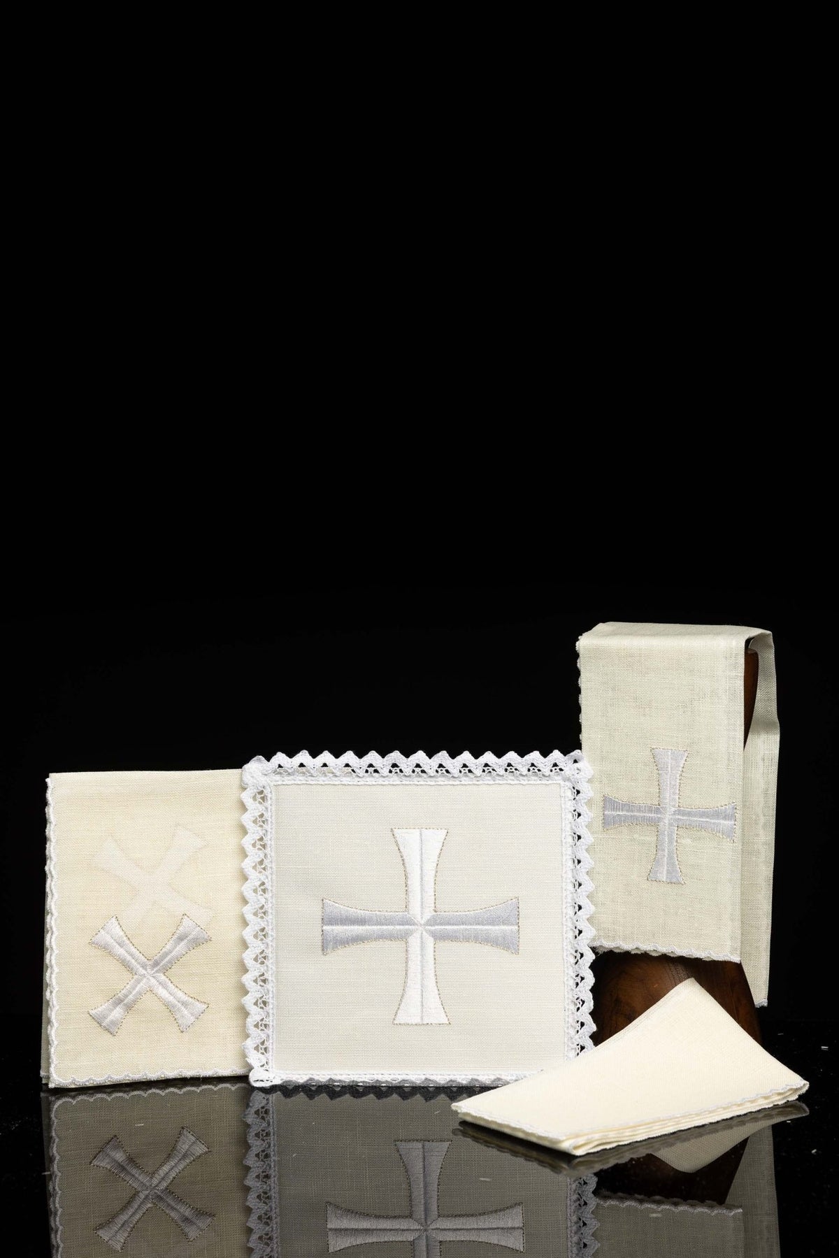 Front view of Chalice Linens with Delicate Cross Embroidery, cream linen with white crosses and lace trim
