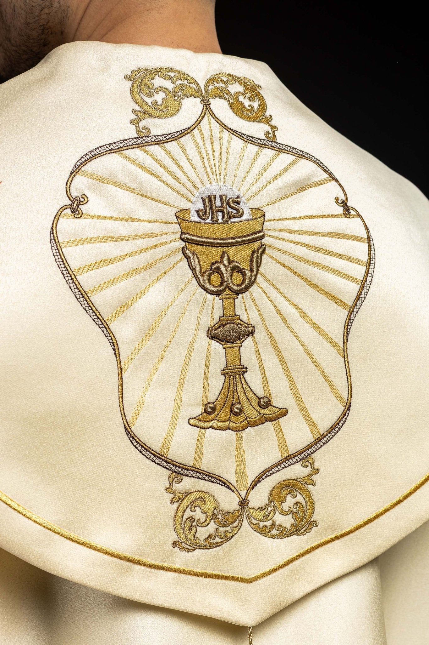 Clerical cope with embroidered gold IHS motif KKP/006/05 ECRU SAT.POMPON 145cm - HAFTINAUSA.COM