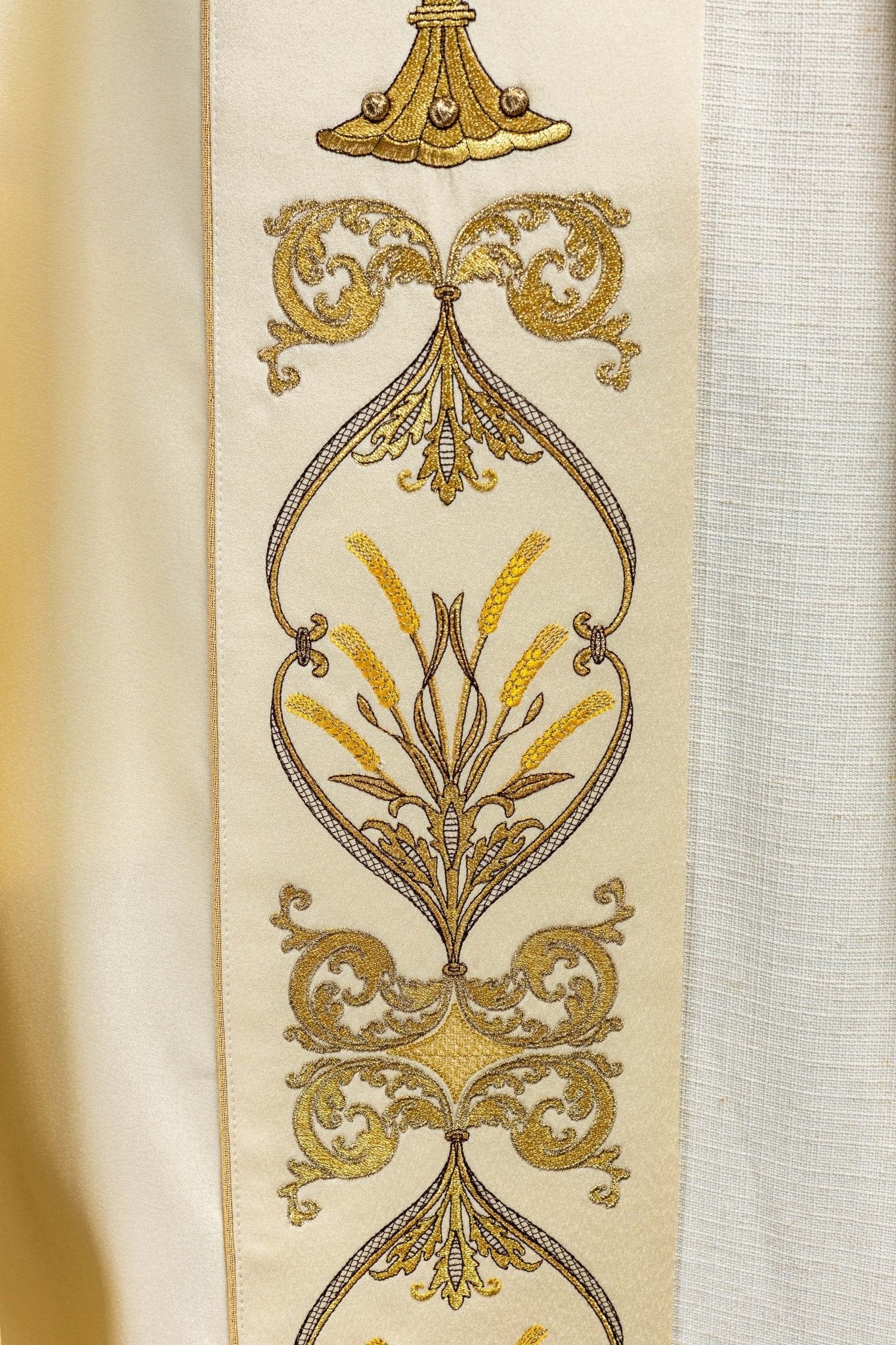 Clerical cope with embroidered gold IHS motif KKP/006/05 ECRU SAT.POMPON 145cm - HAFTINAUSA.COM