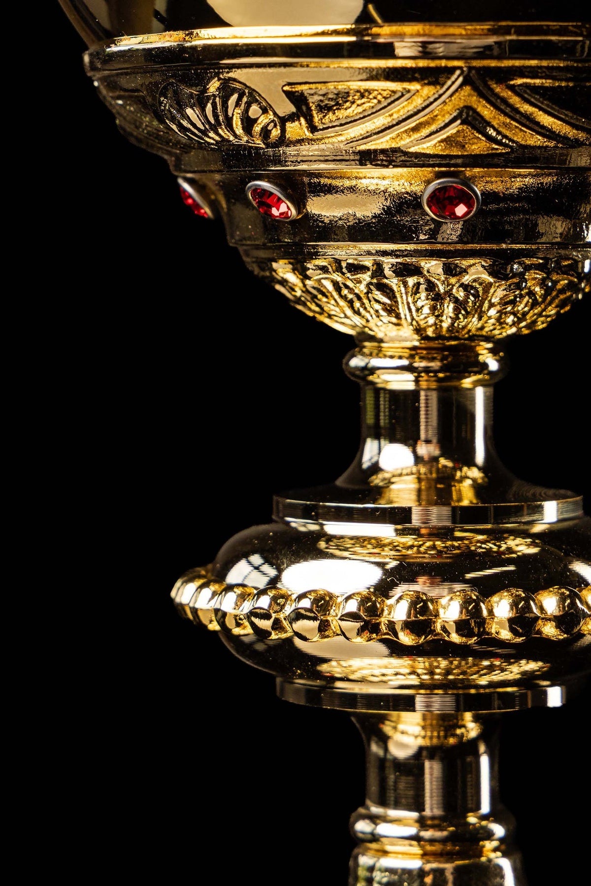 Close-up of the gold-plated chalice bowl and beaded stem detail with imitation rubies