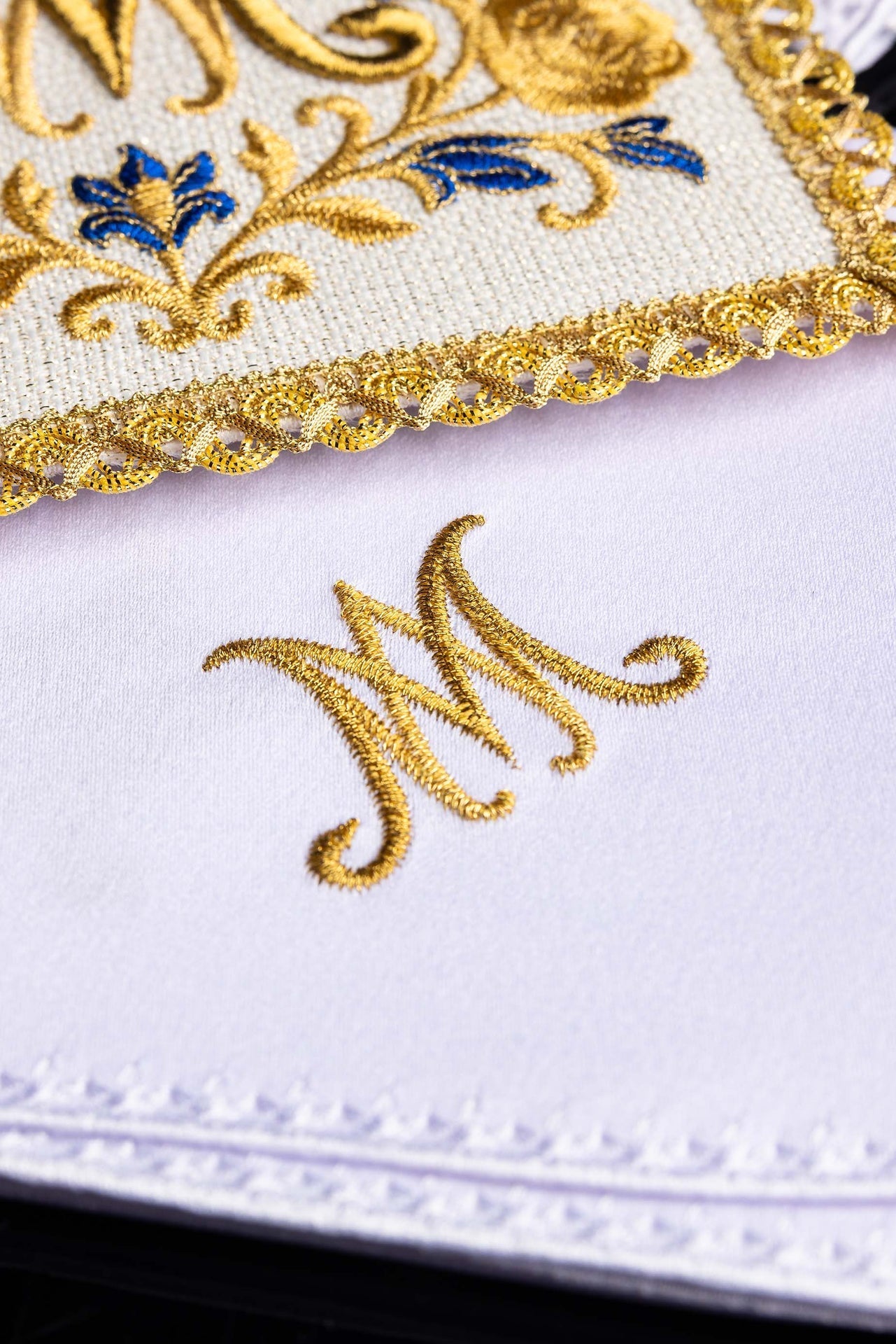 Embroidered chalice linens set with a Marian symbol