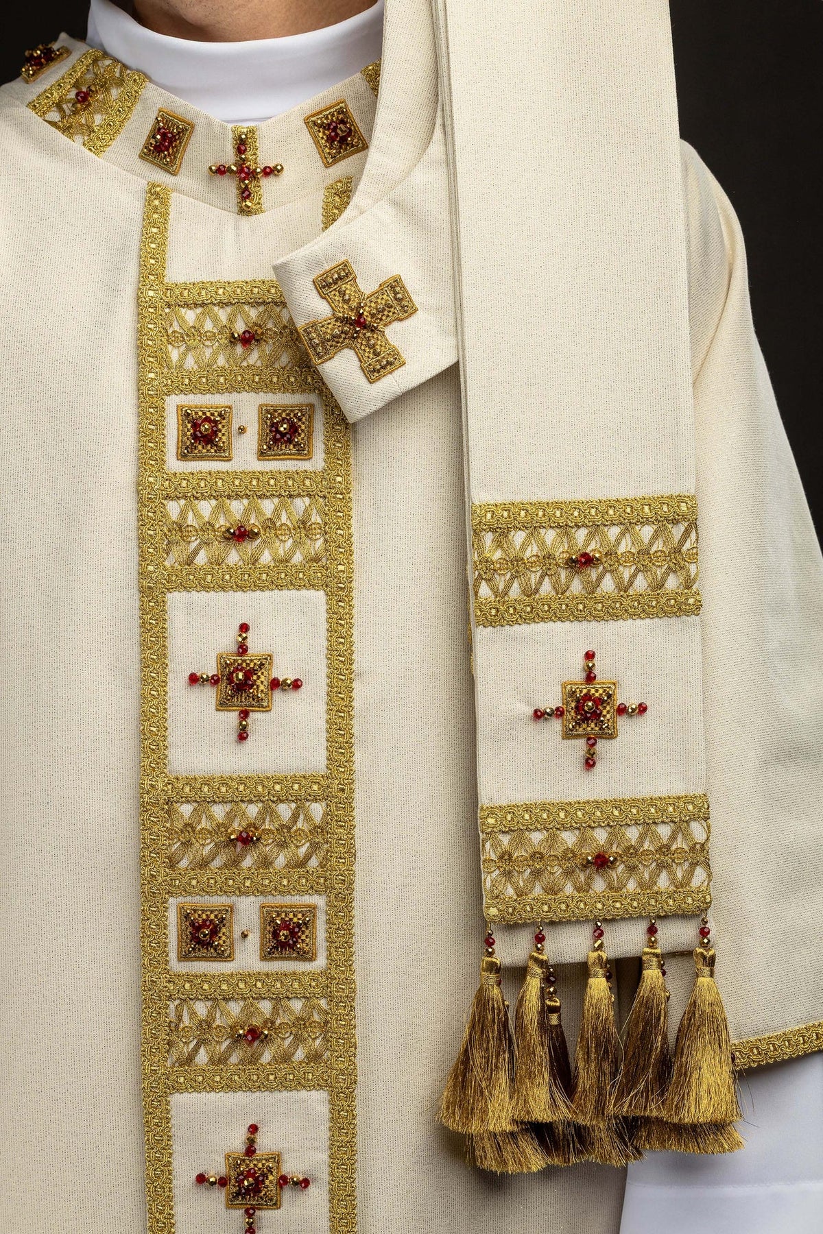 Close-up of the chasuble front panel with jeweled crosses and gold openwork