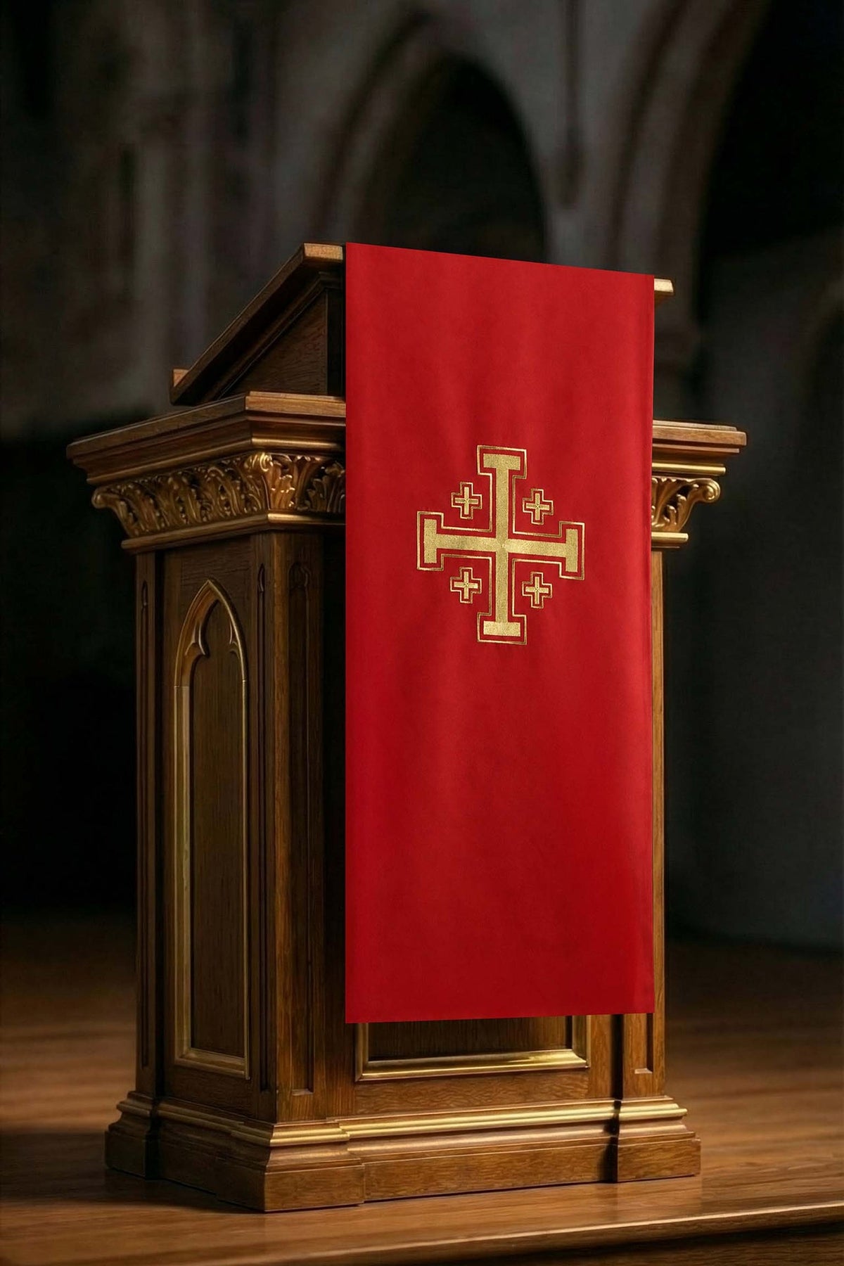 Front view of a Church lectern cover embroidered in gold with a Jerusalem cross, red fabric