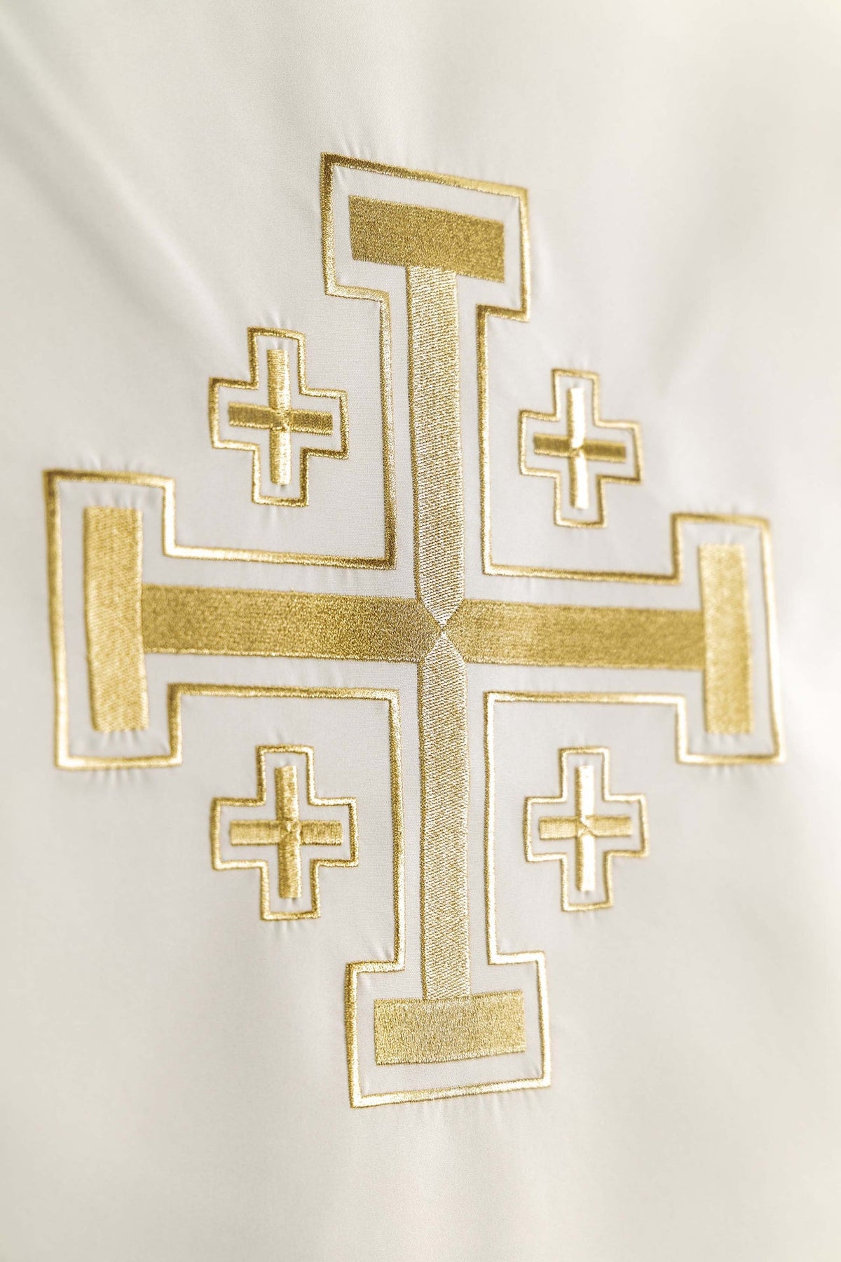 Close-up of the church lectern cover with gold Jerusalem cross embroidery