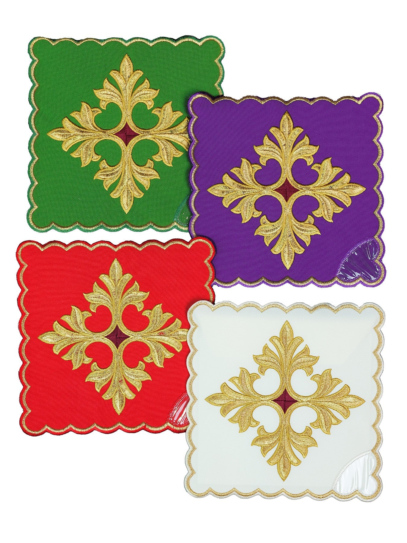 Set of chalice palls with a cross symbol in four liturgical colors