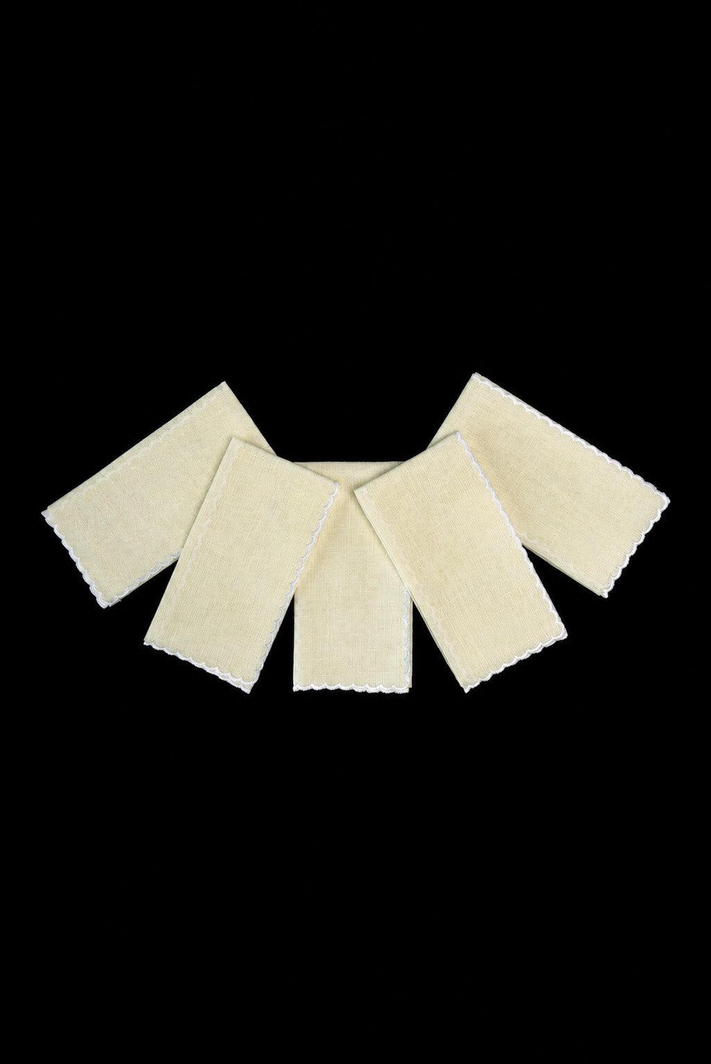 Front view of Lavabo Towel Set Finished with a White Wavy Border in ecru linen