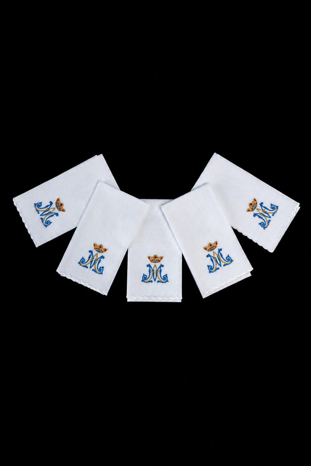 Front view of White Set of 5 Purificators Embroidered with a Marian Monogram, white with blue and gold embroidery