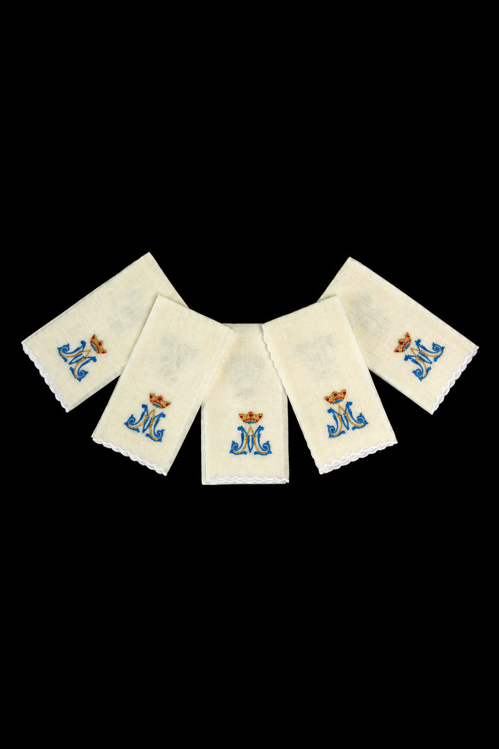 Front view of 5 Linen Purificators Embroidered with a Crowned Marian Monogram in ecru