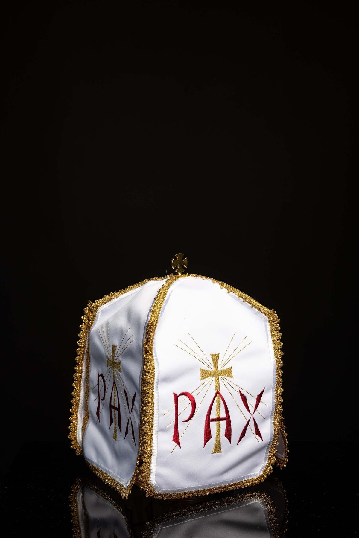 Front view of Ciborium Veil Embroidered with PAX and a Cross with Radiant Rays in white and gold