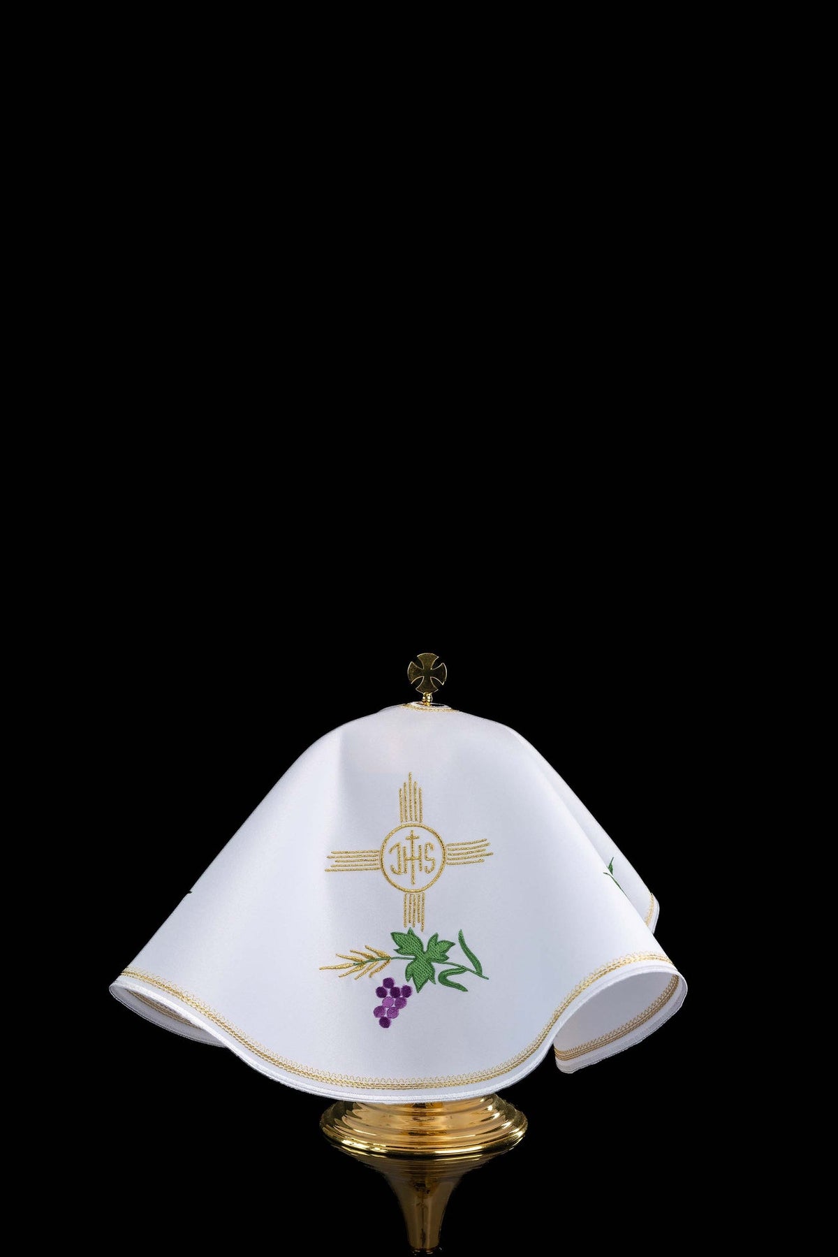 Front view of a white Round Ciborium Veil Embroidered with IHS and Eucharistic Motifs with gold edging