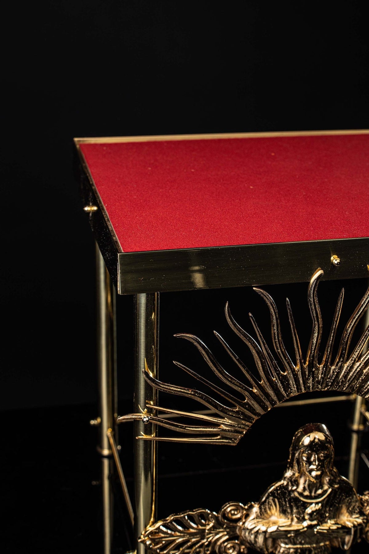 Close-up of the monstrance throne showing the gilded Christ figure and scrollwork