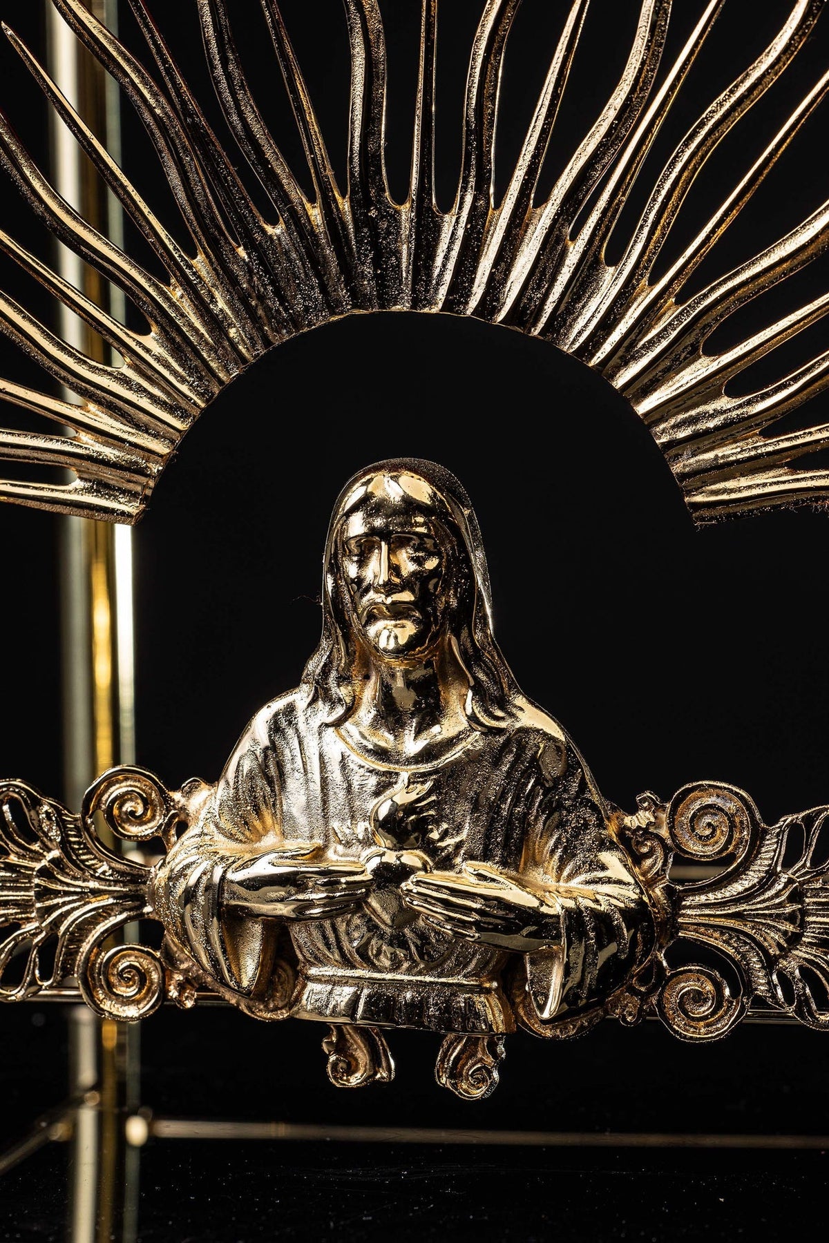 Side view of the monstrance throne showing the red velvet top and radiant ornamentation