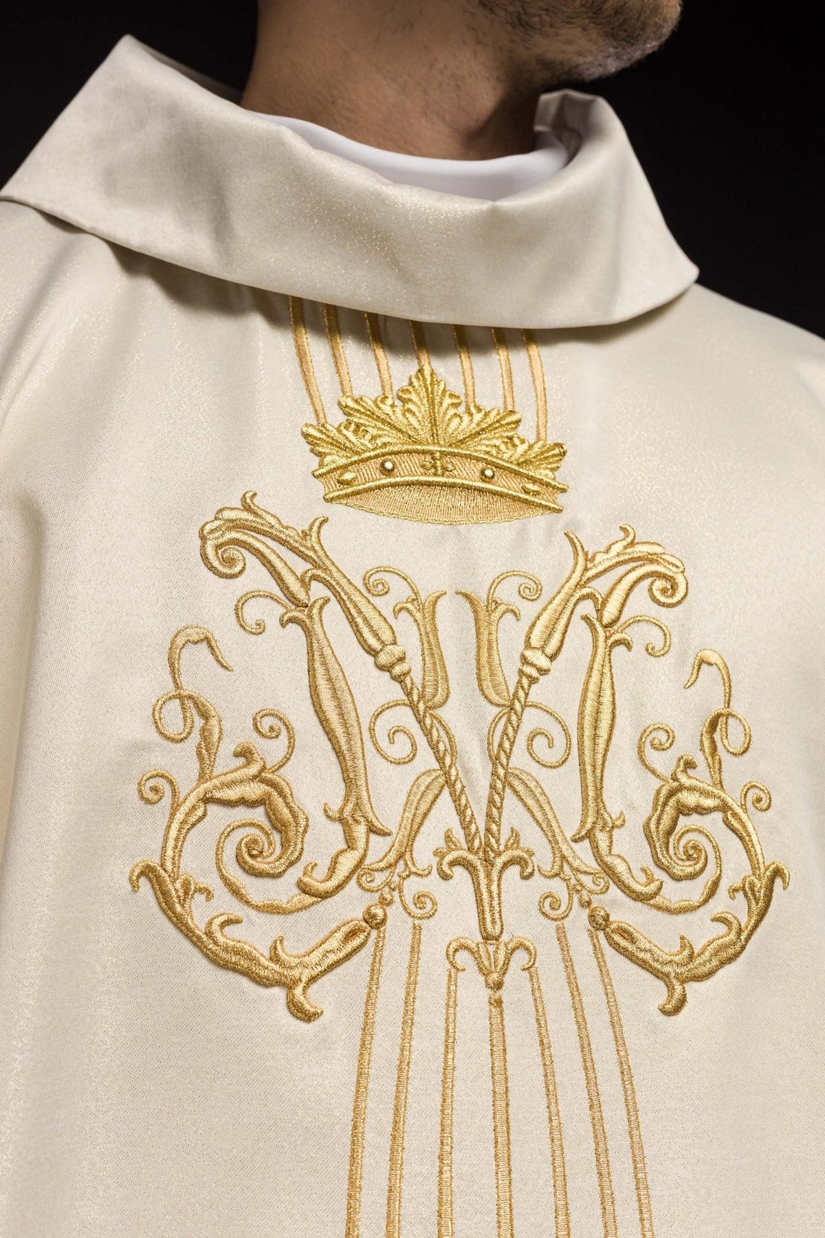 Close-up of the chasuble stand-up collar and embroidered gold crown