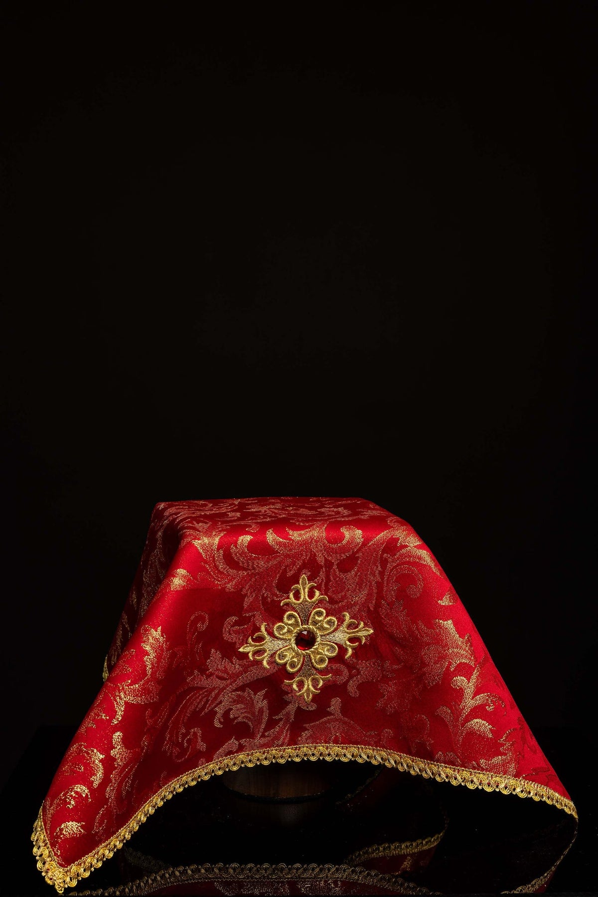 Front view of a Red Chalice Veil Embroidered with a Gold Cross and Red Stone