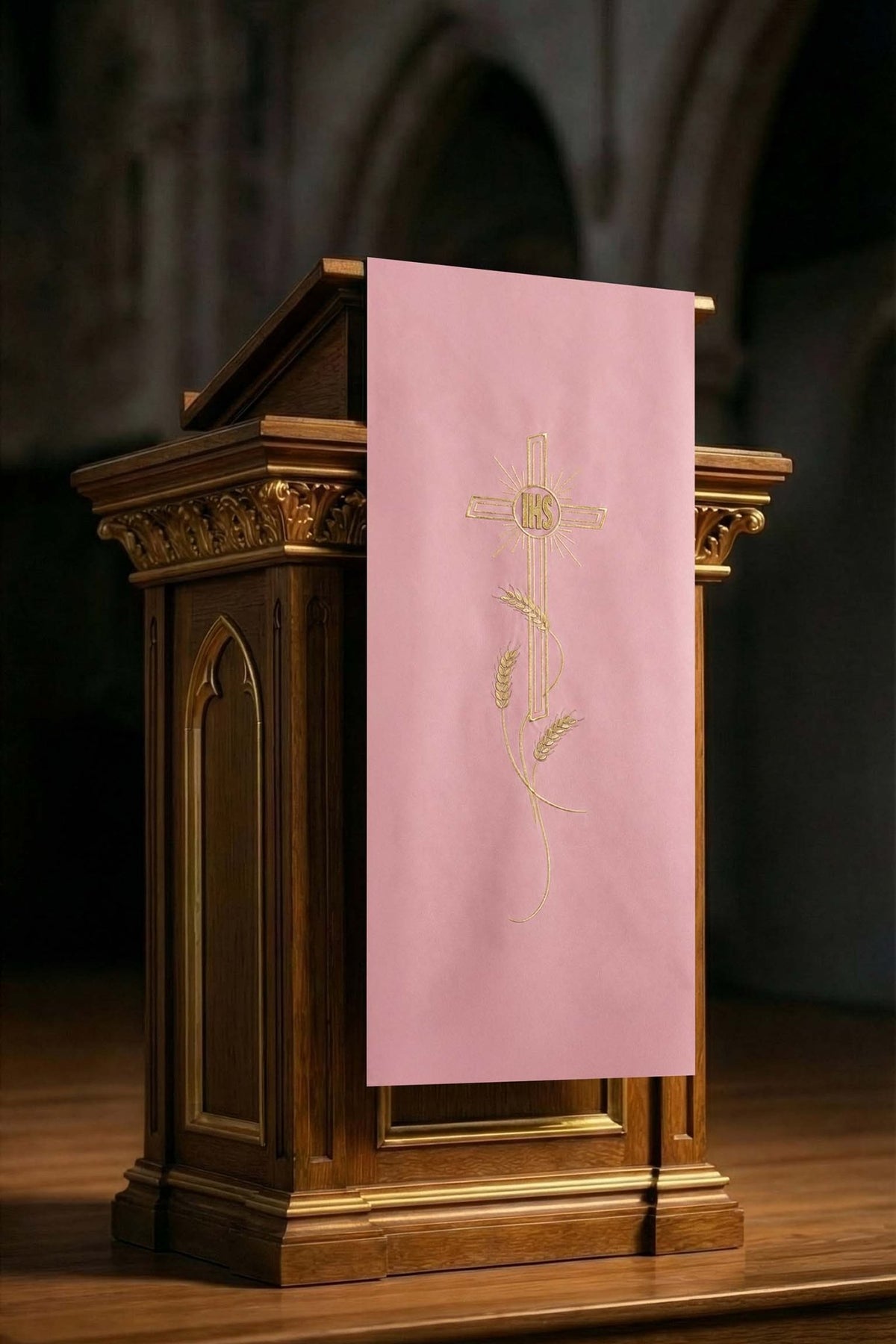 Front view of a Pink Lectern Cloth with Embroidered Cross Motif, showing the full pink cloth with gold cross and wheat