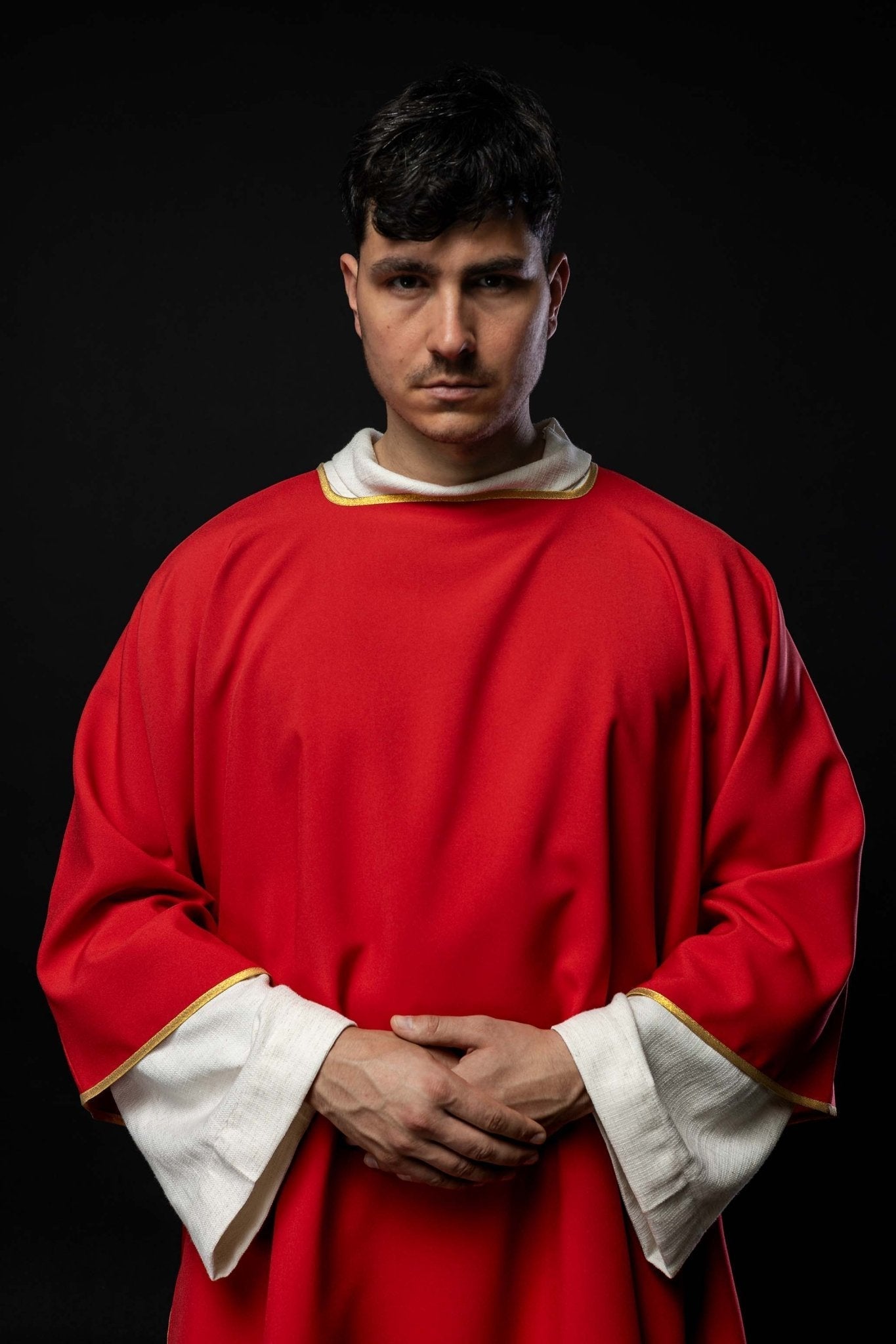 Plain dalmatic in red with gold trim KDL/1002/02/12/D - HAFTINAUSA.COM