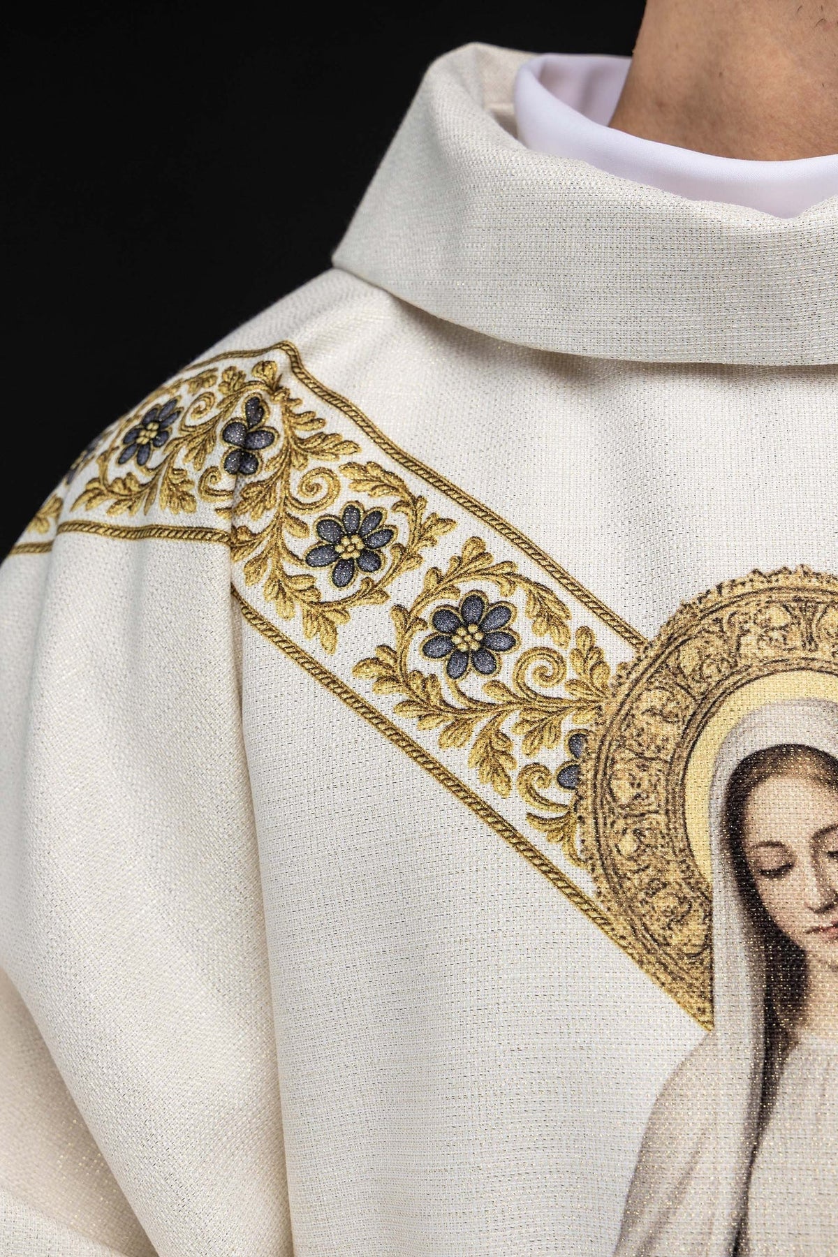 Side detail of the chasuble collar and gold-and-blue floral band